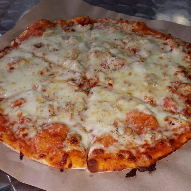 Pizza mediana de pollo con extra queso