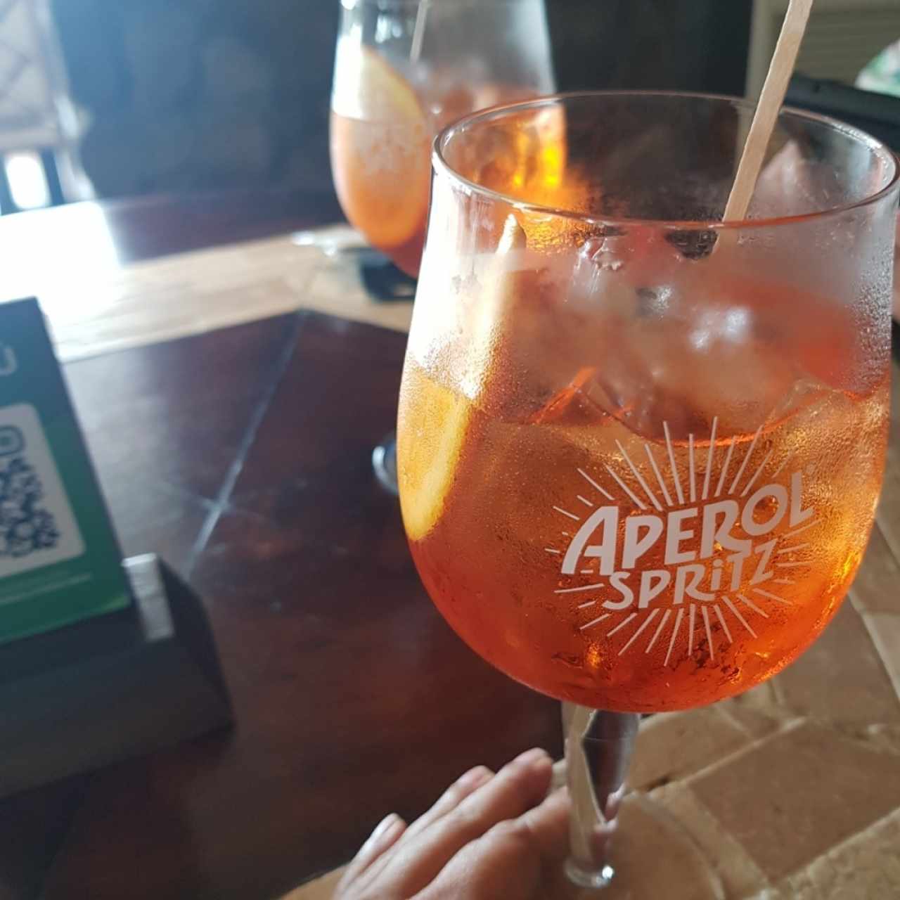 Coctel Aperol Spritz, con licor de manzana suave y a la vez refrescante 