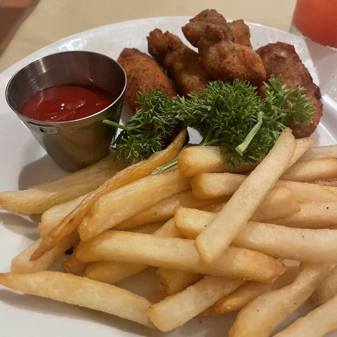 Chicken or fish nuggets with fries