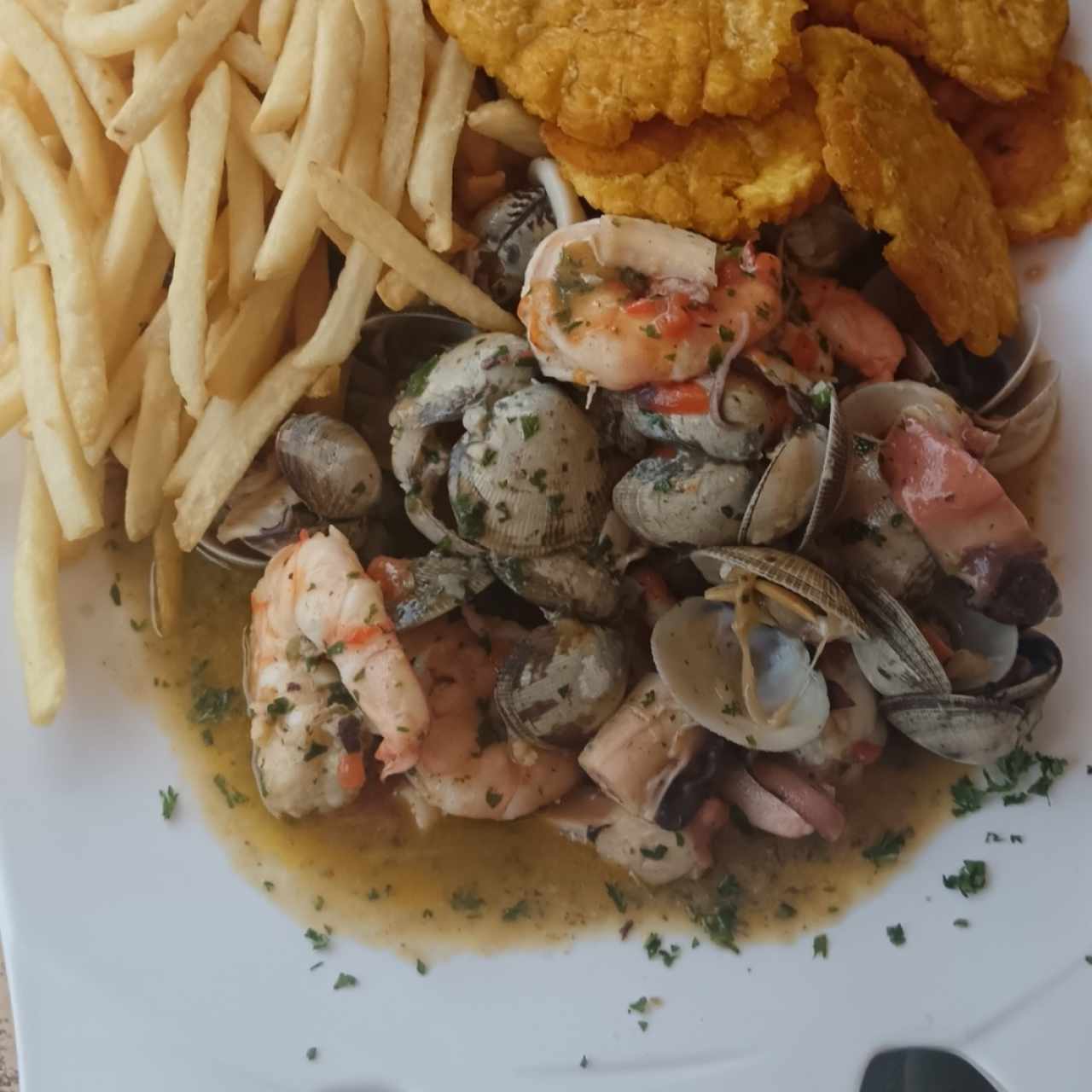 Piqué de Mariscos al Olio a las Finas Hierbas