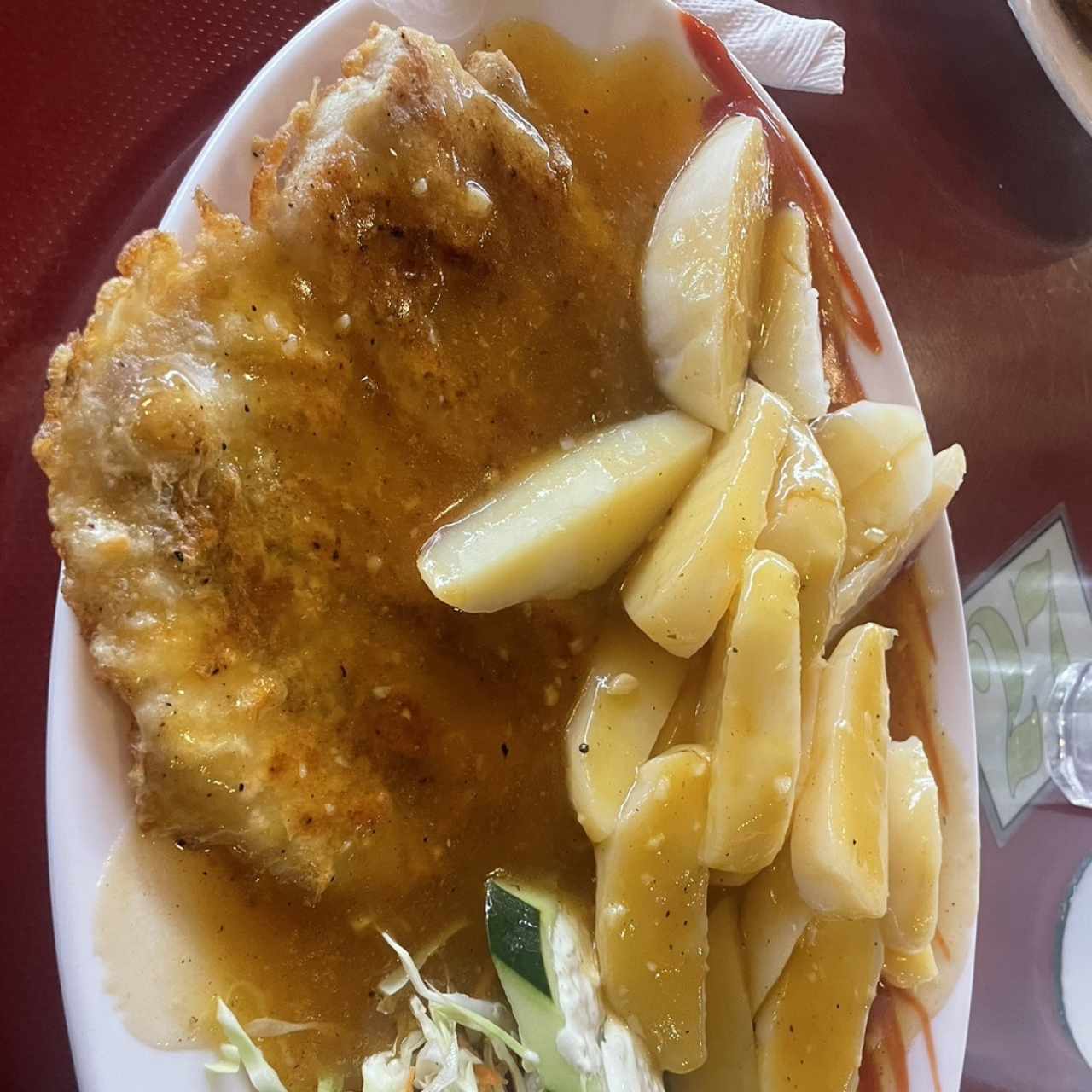 Pescado al ajillo con papas salteadas