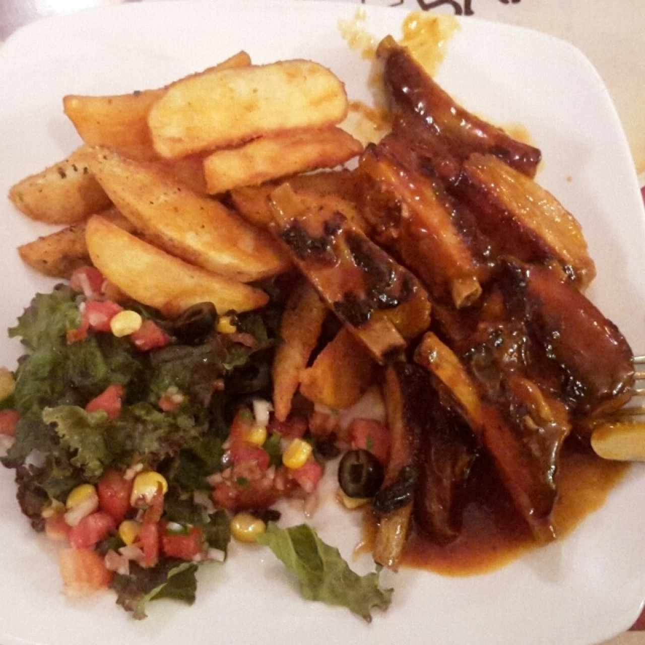 Spare Ribs in Barbacue Sauce with Western Potatoes & veggie salad