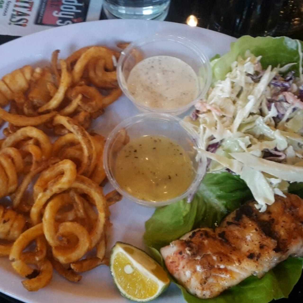 Red Snapper Fillet with curled french fries and Salad