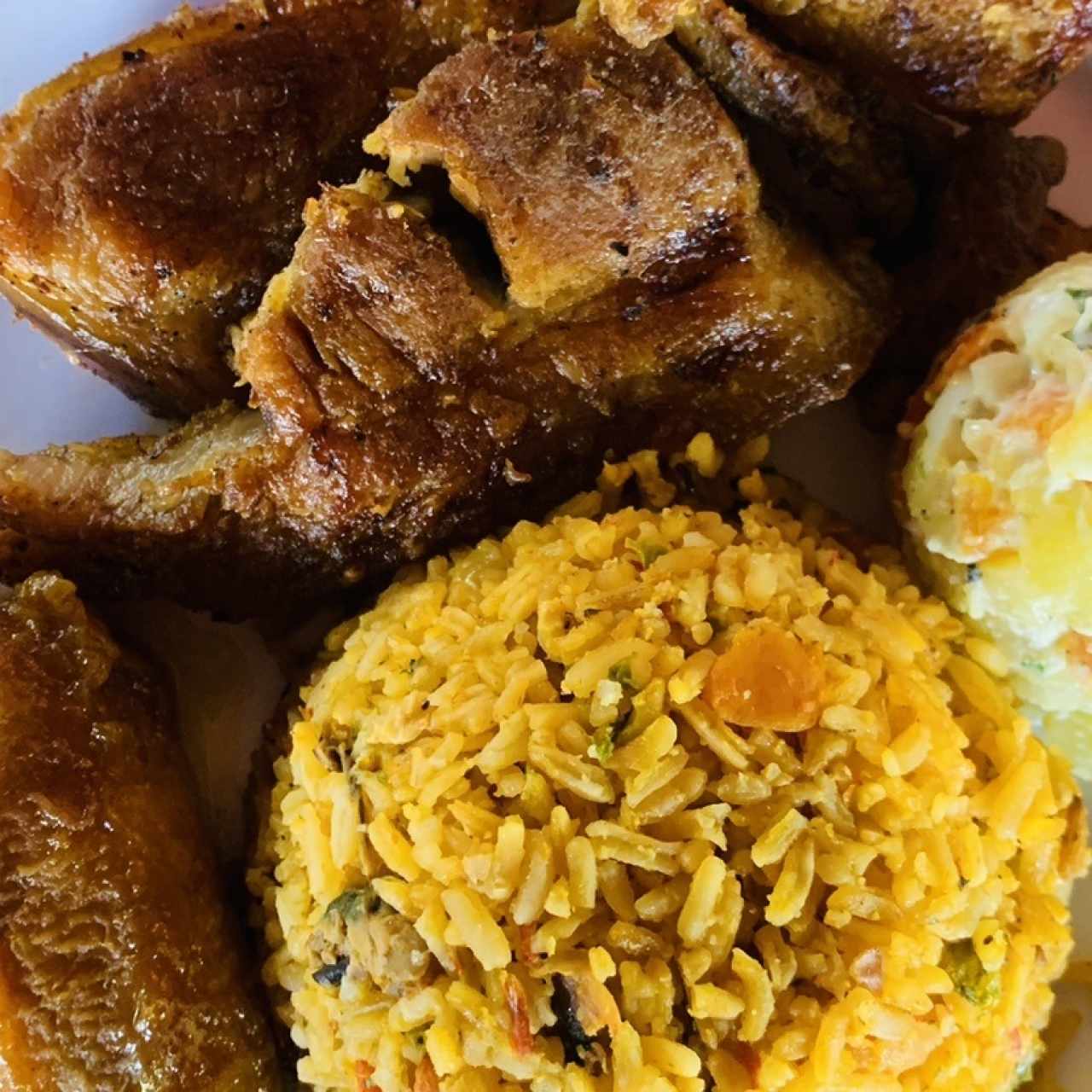 Puerco y arroz con pollo