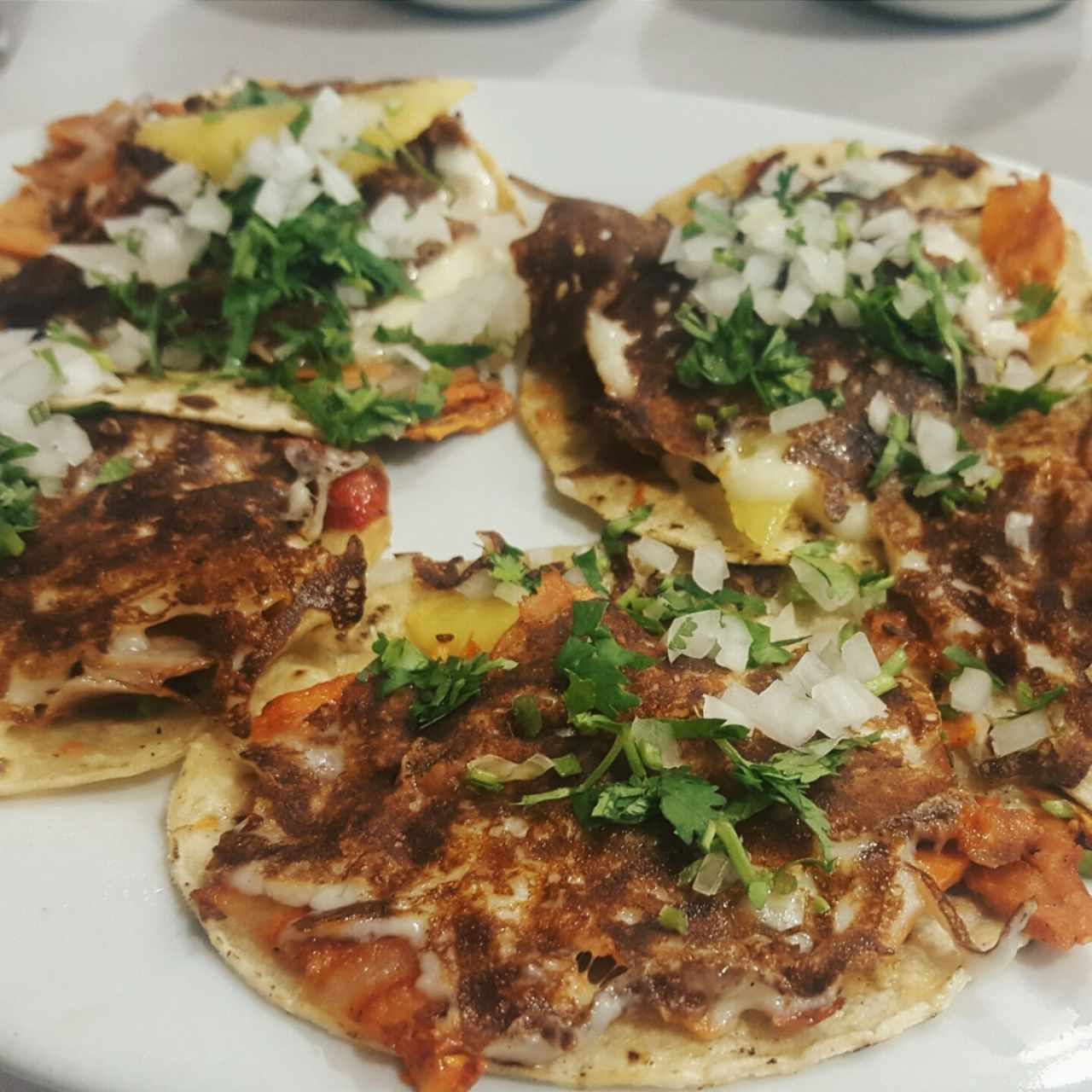 Tacos al pastor con queso