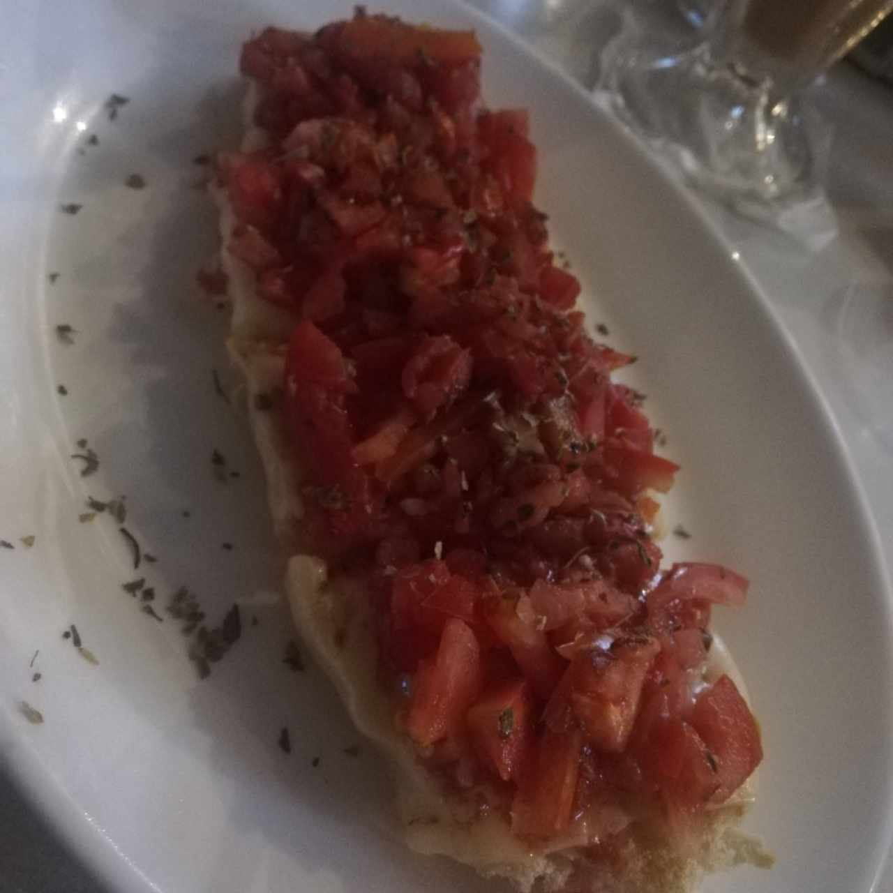 Bruchetta de mozarella con tomate
