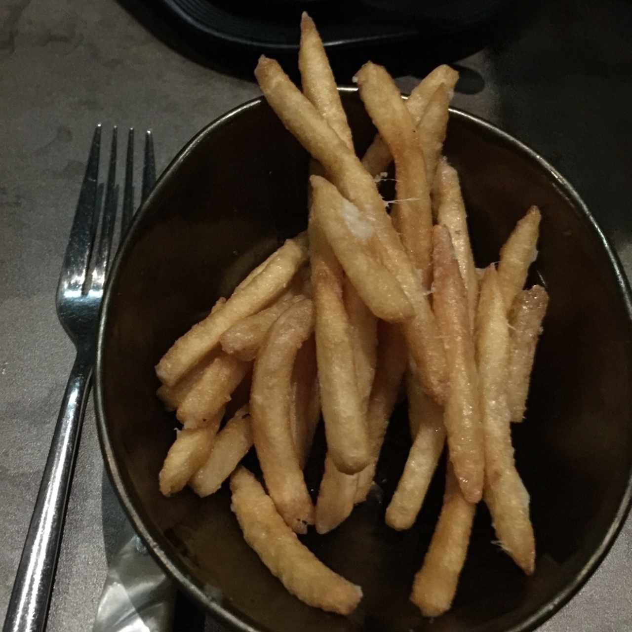 Papas francesas con perfume de trufas y Granna Padano