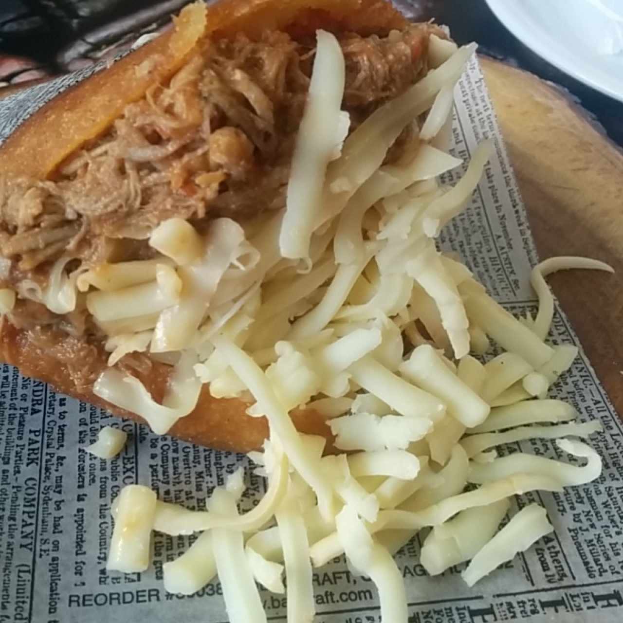 Arepa de Chicharrón con Ropa Vieja y Queso Gouda