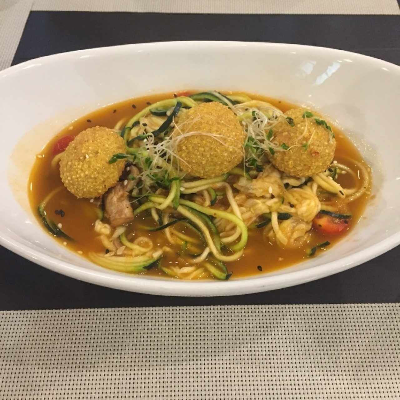 zucchini spaghetti with pollo and quinoa balls