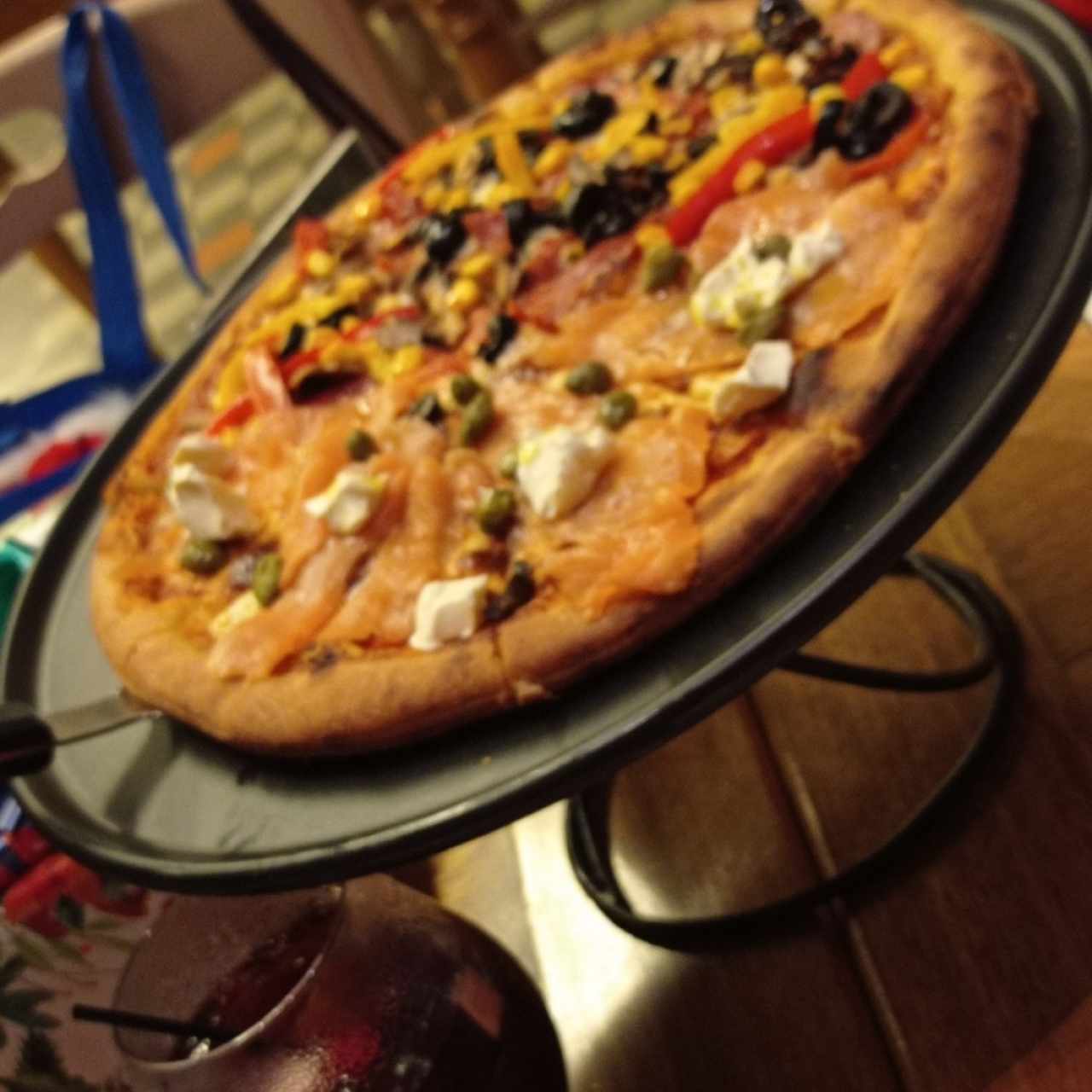 Pizza mitad Salmoneta y mitad Rústica