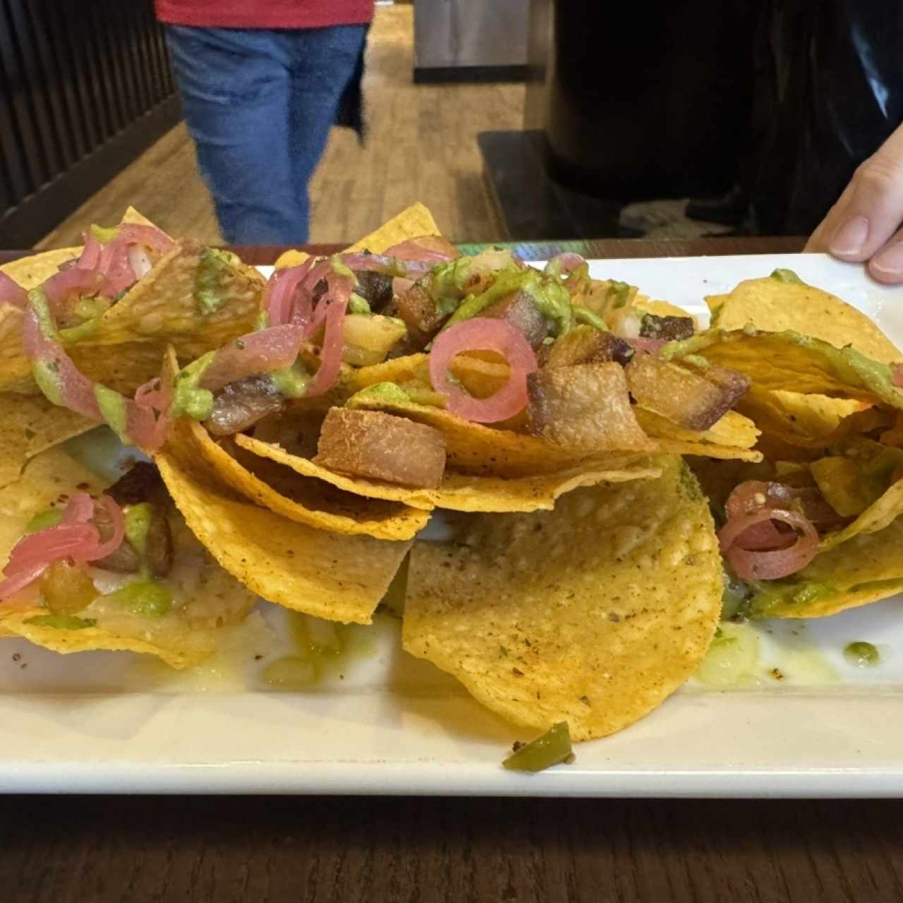 Pork Belly Nachos (y el queso a donde??)