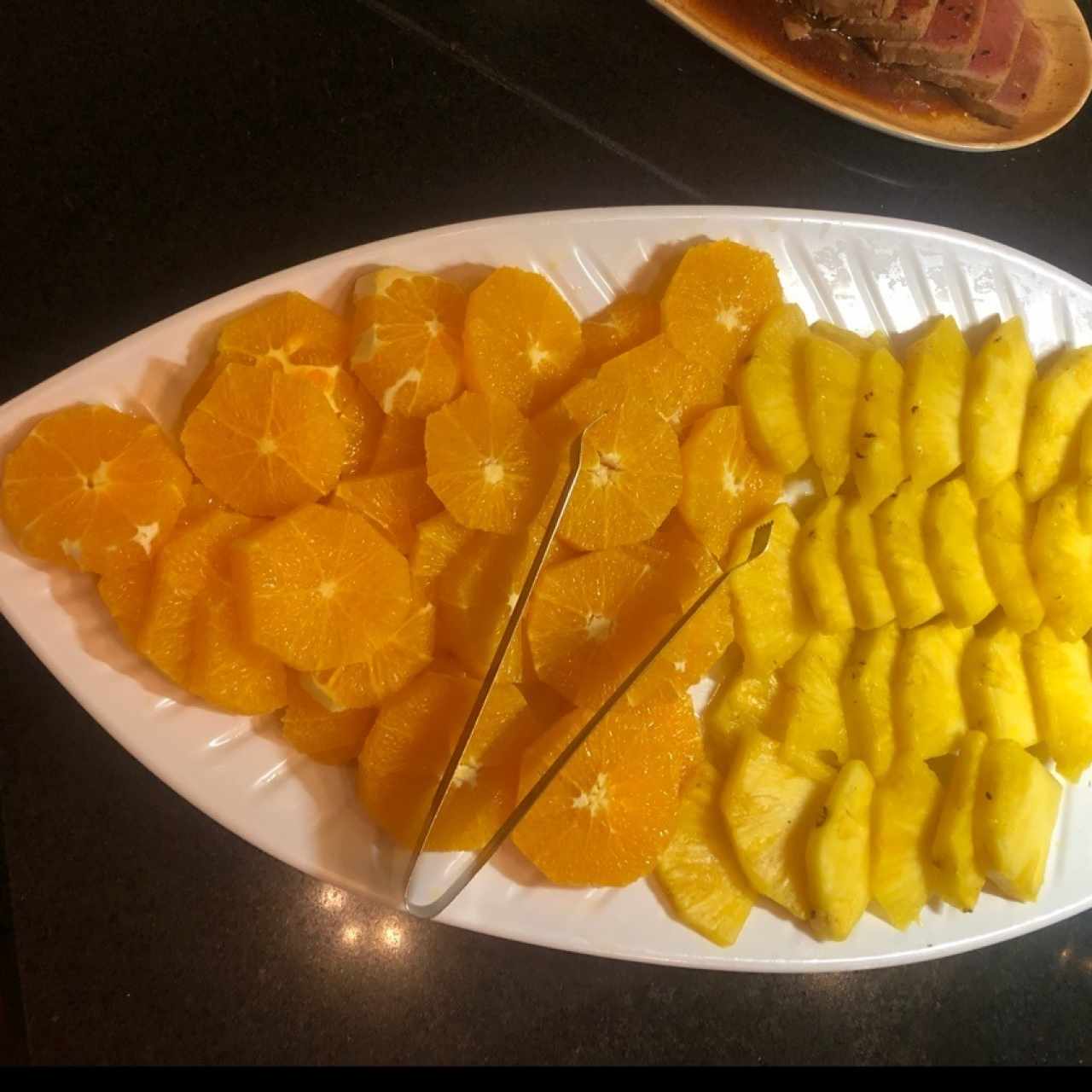 Piñas y Naranjas