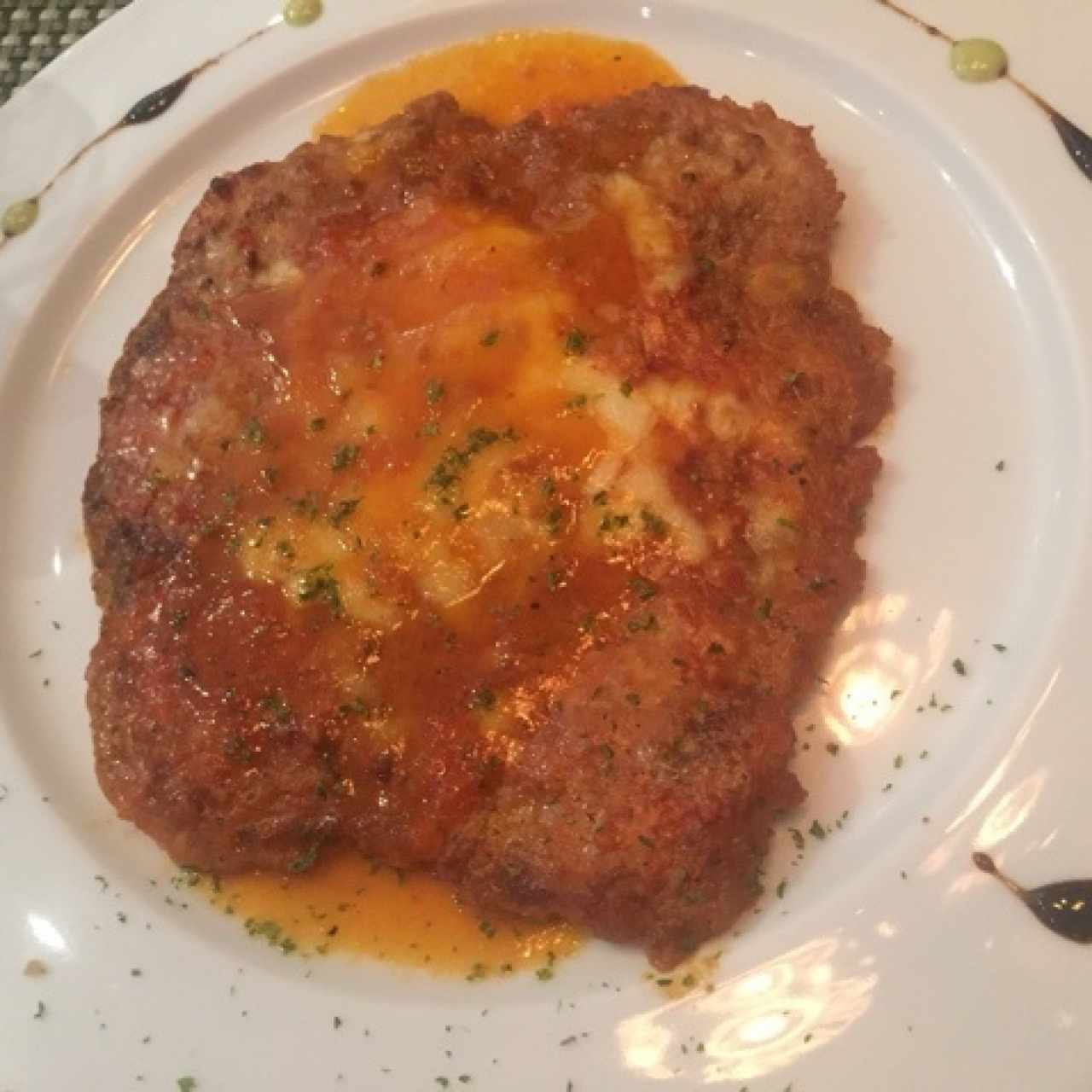 Milanesa de Pollo a la Parmesana.