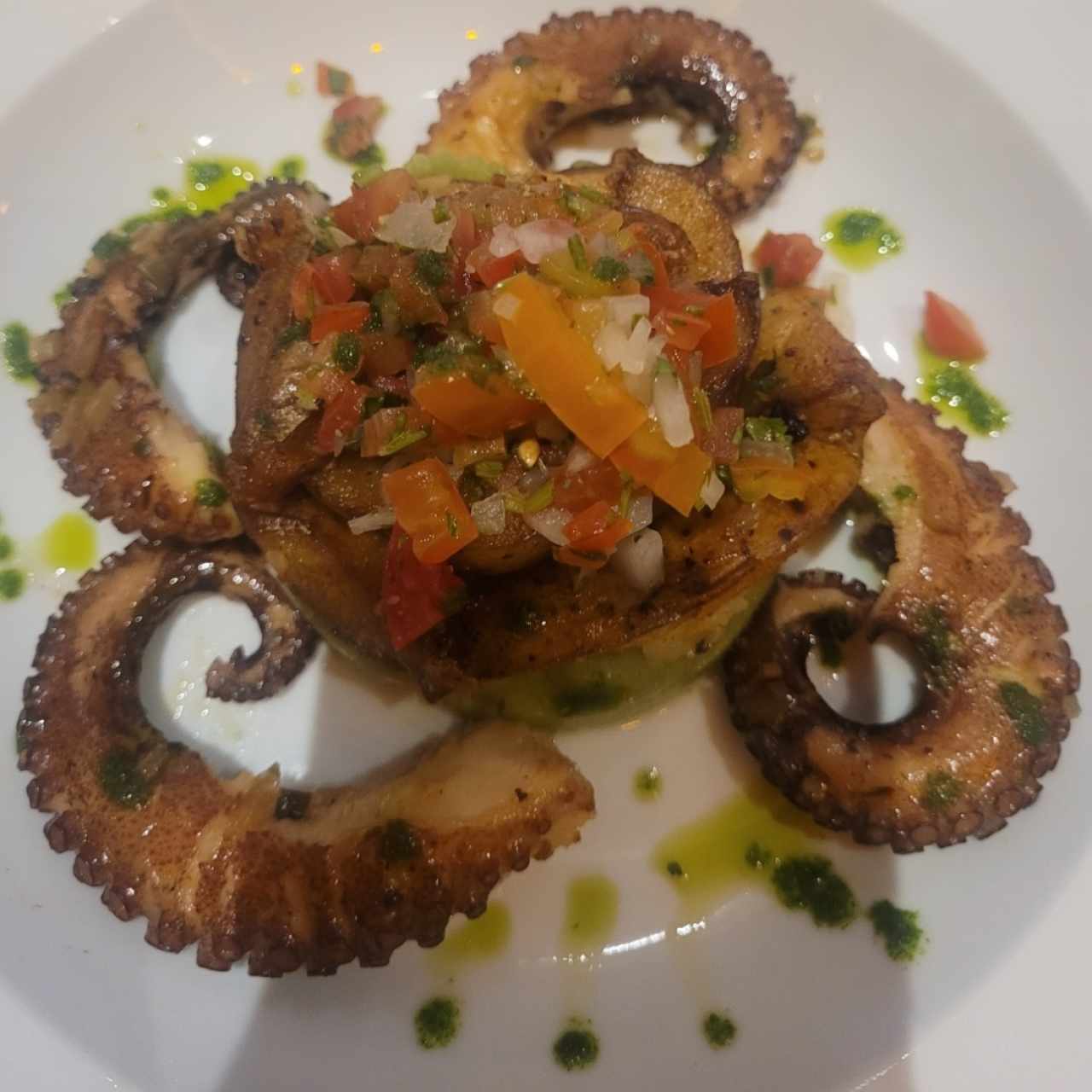 pulpo en cama de papas