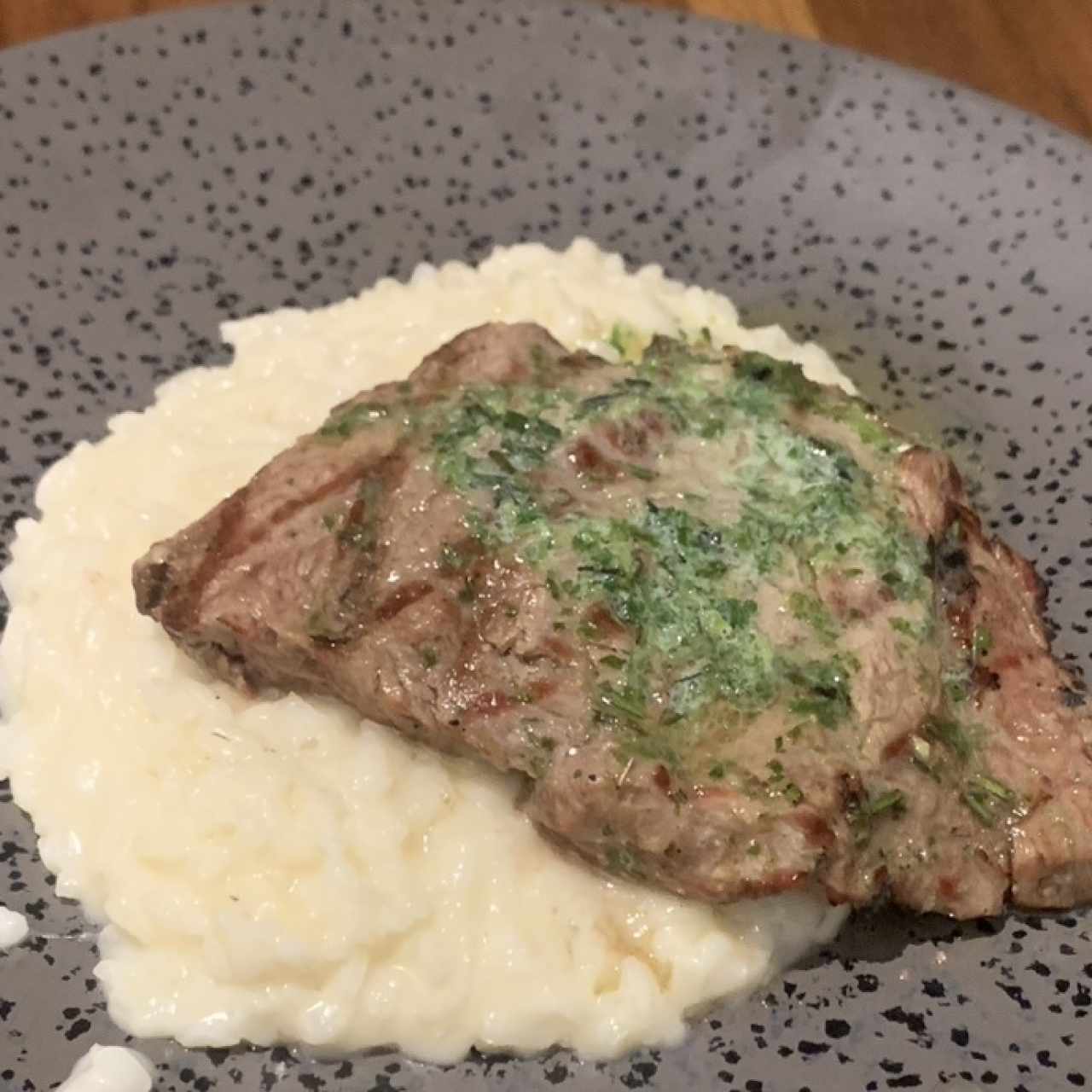 Filete con risotto de parmesano