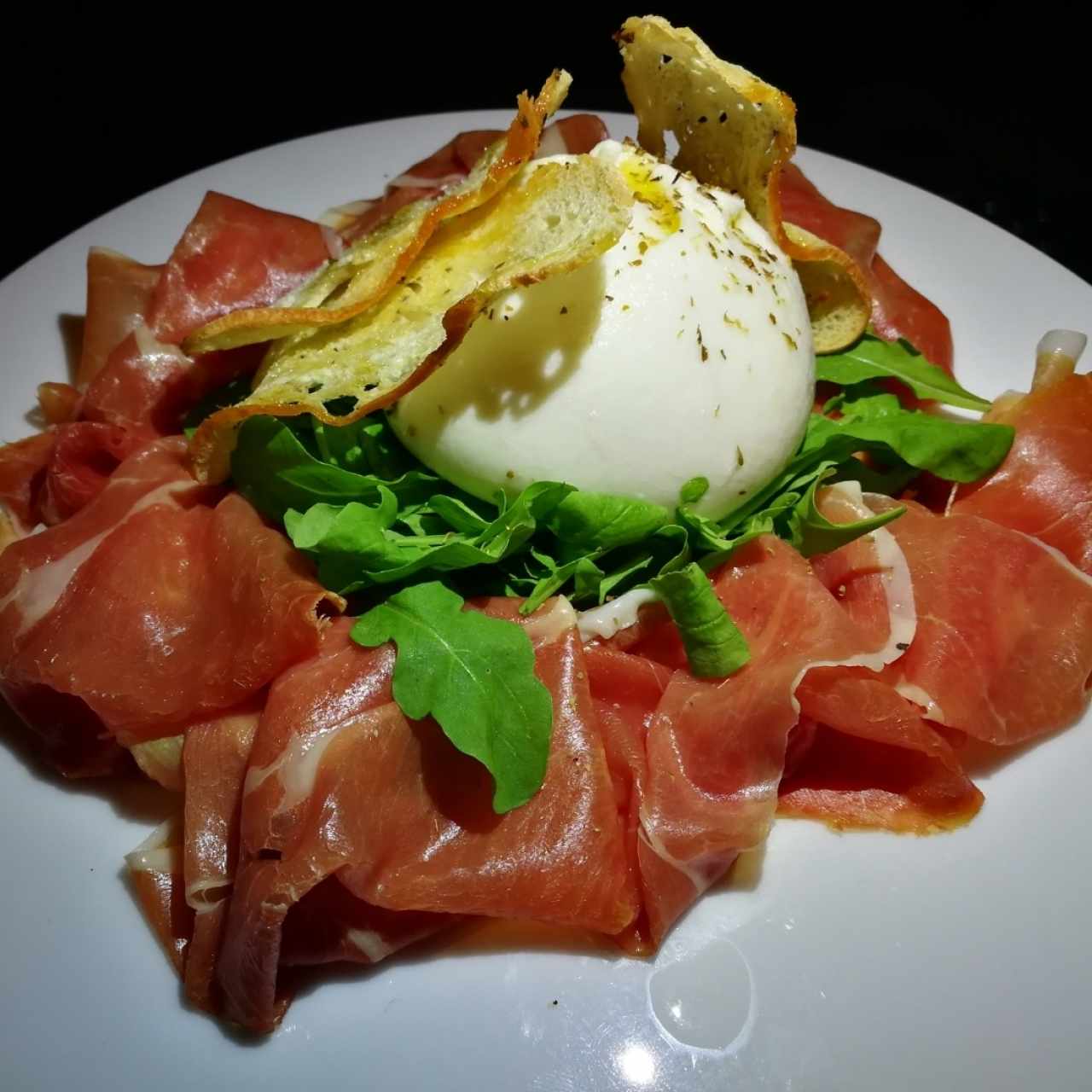 Burrata con prosciutto