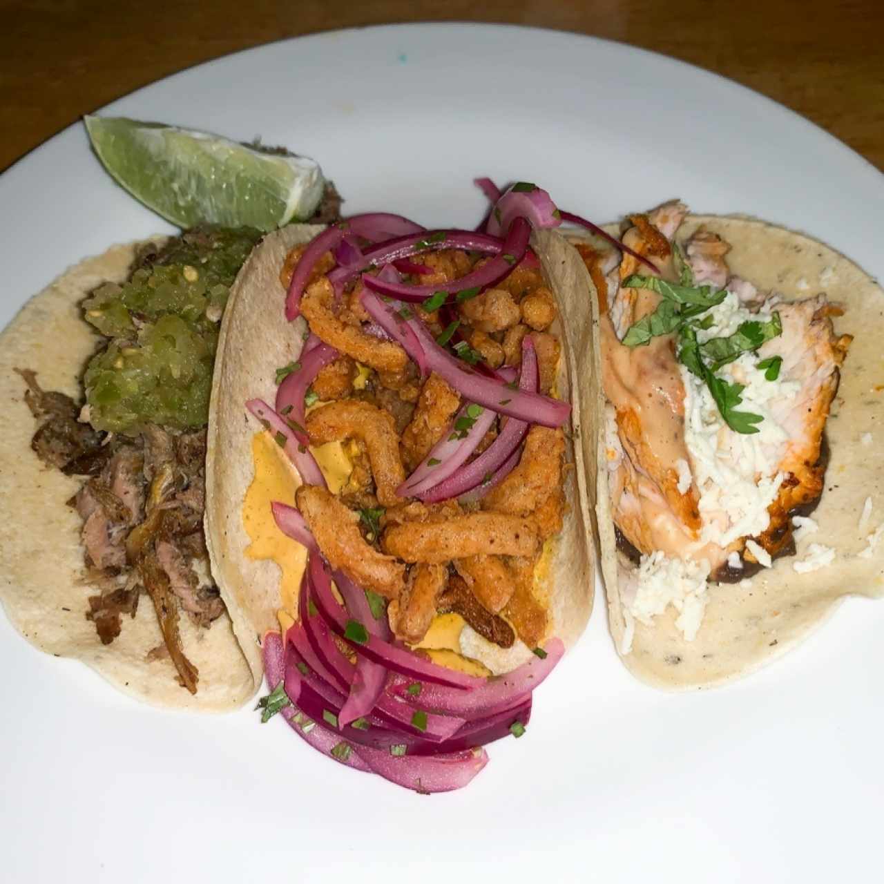 Tacos: Carnitas, Calamar, Pollo Pistolero
