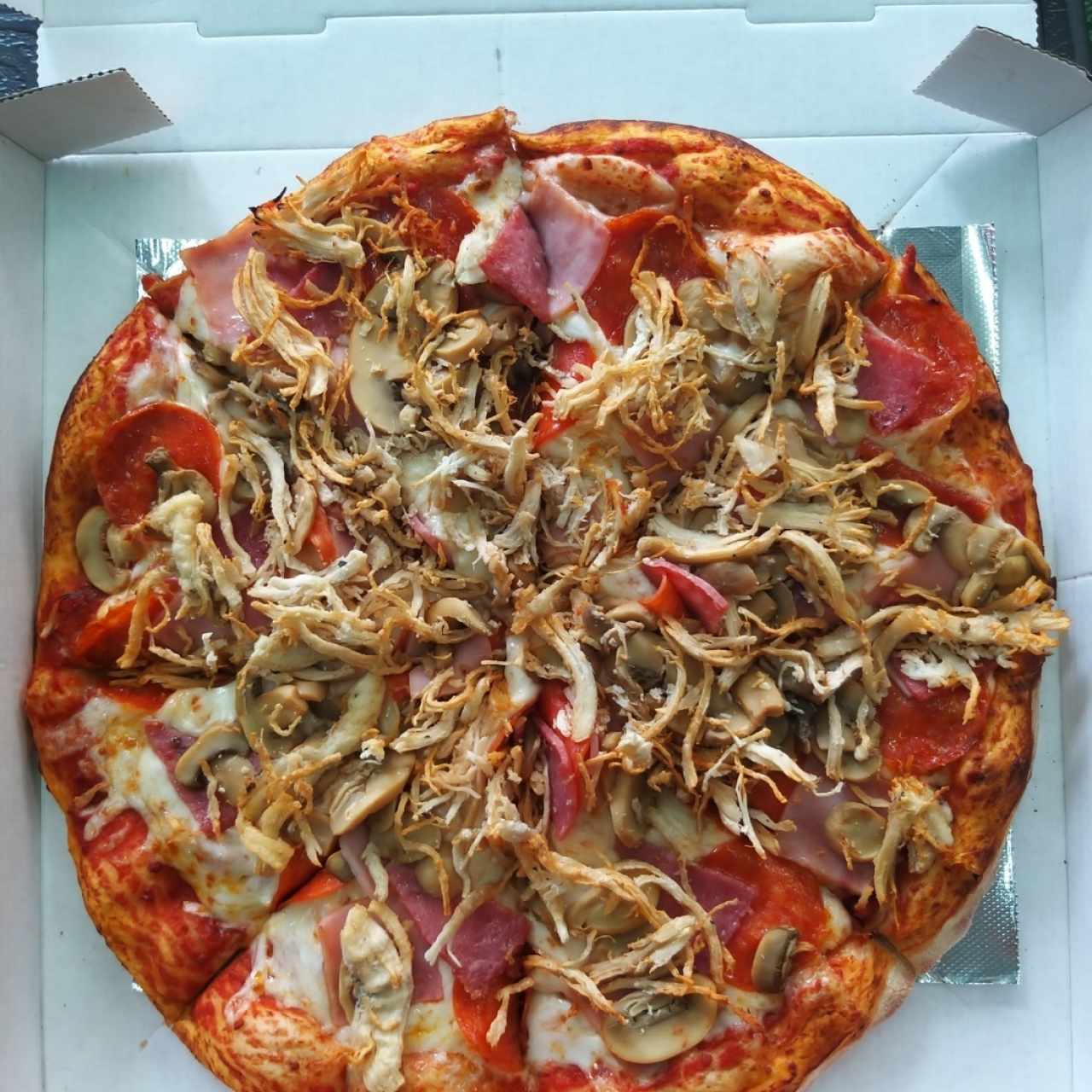 Pizza italia + extra de pollo