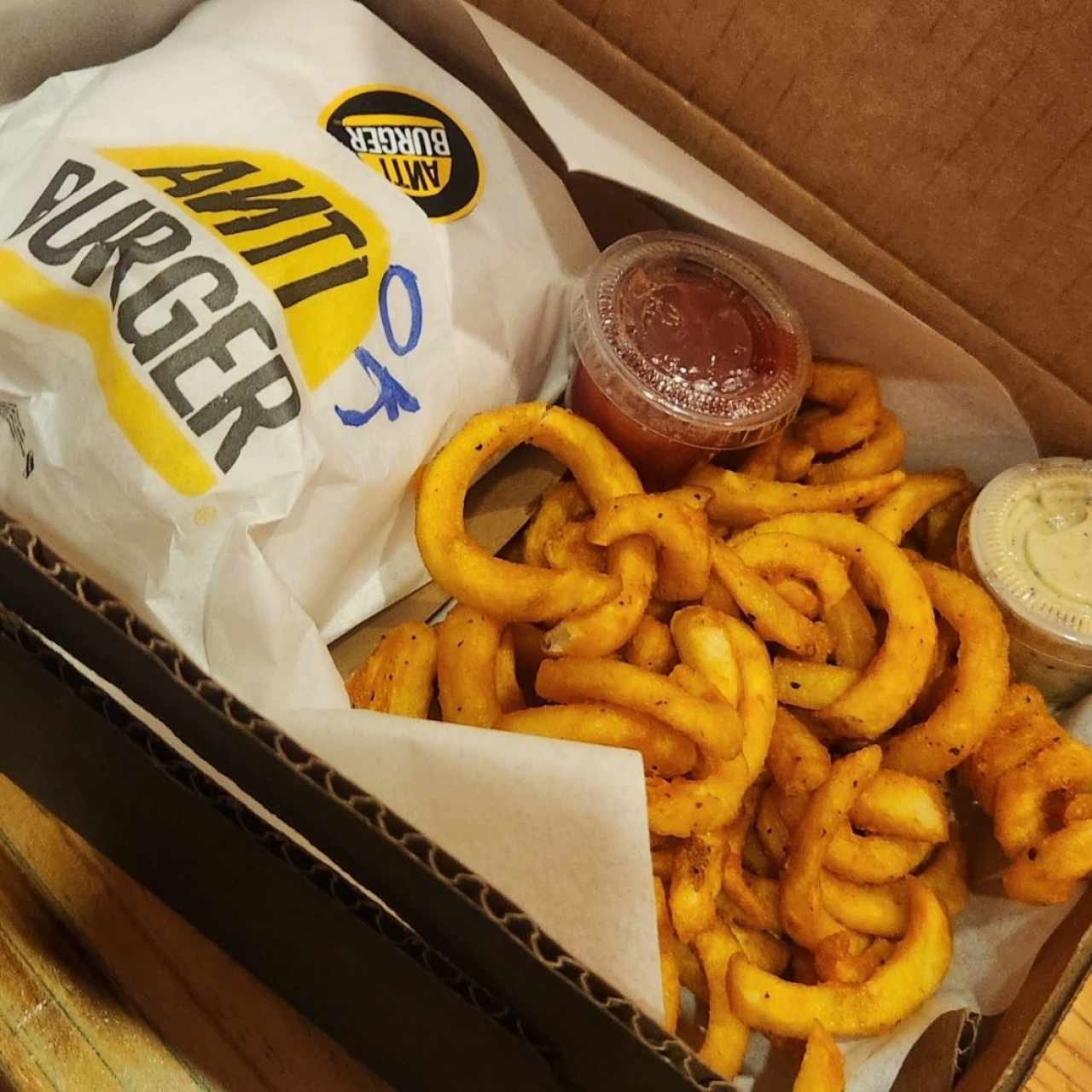 Oklahoma box w/curly fries.