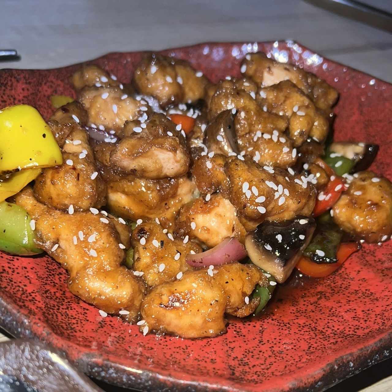 OUR FAMOUS SESAME CHICKEN