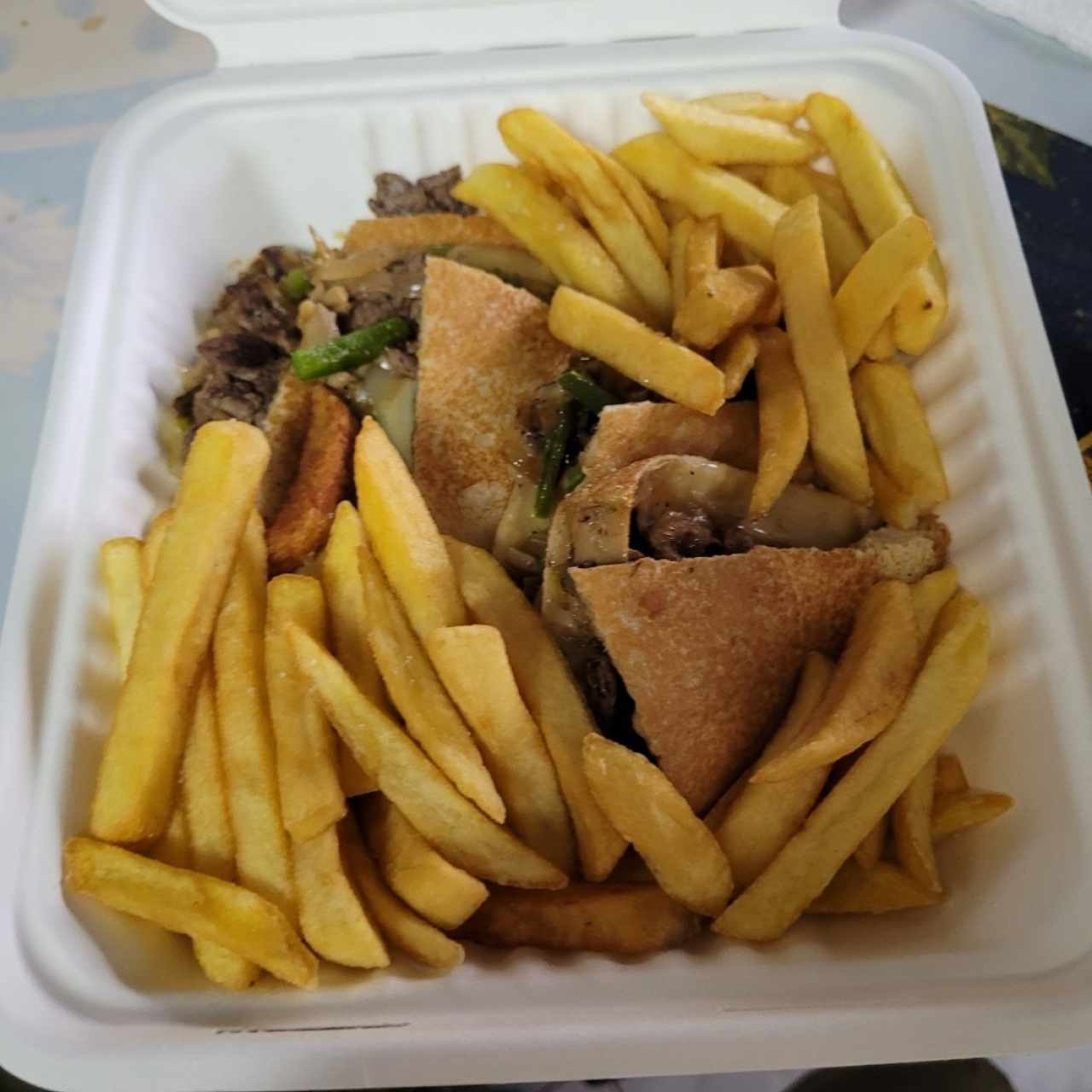 Philly Steak Sandwich/ Papas Fritas