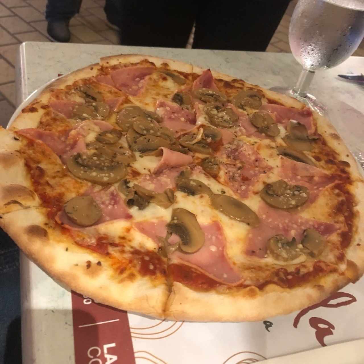 pizza personal de champiñon con jamon