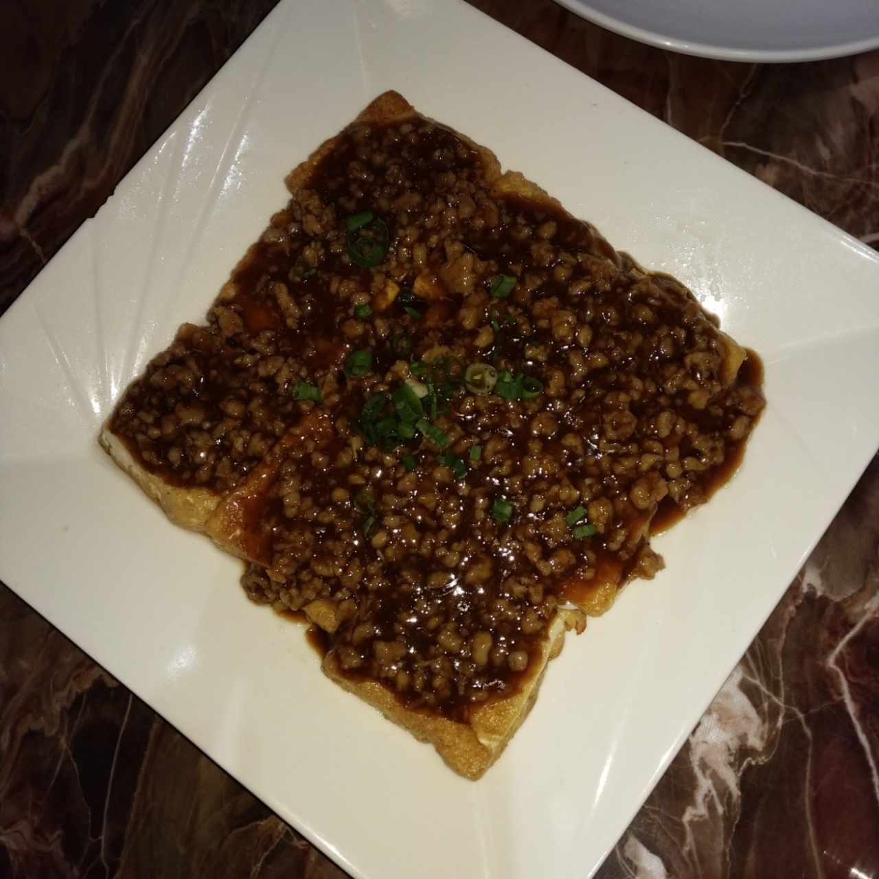 tofu frito con puerco molido