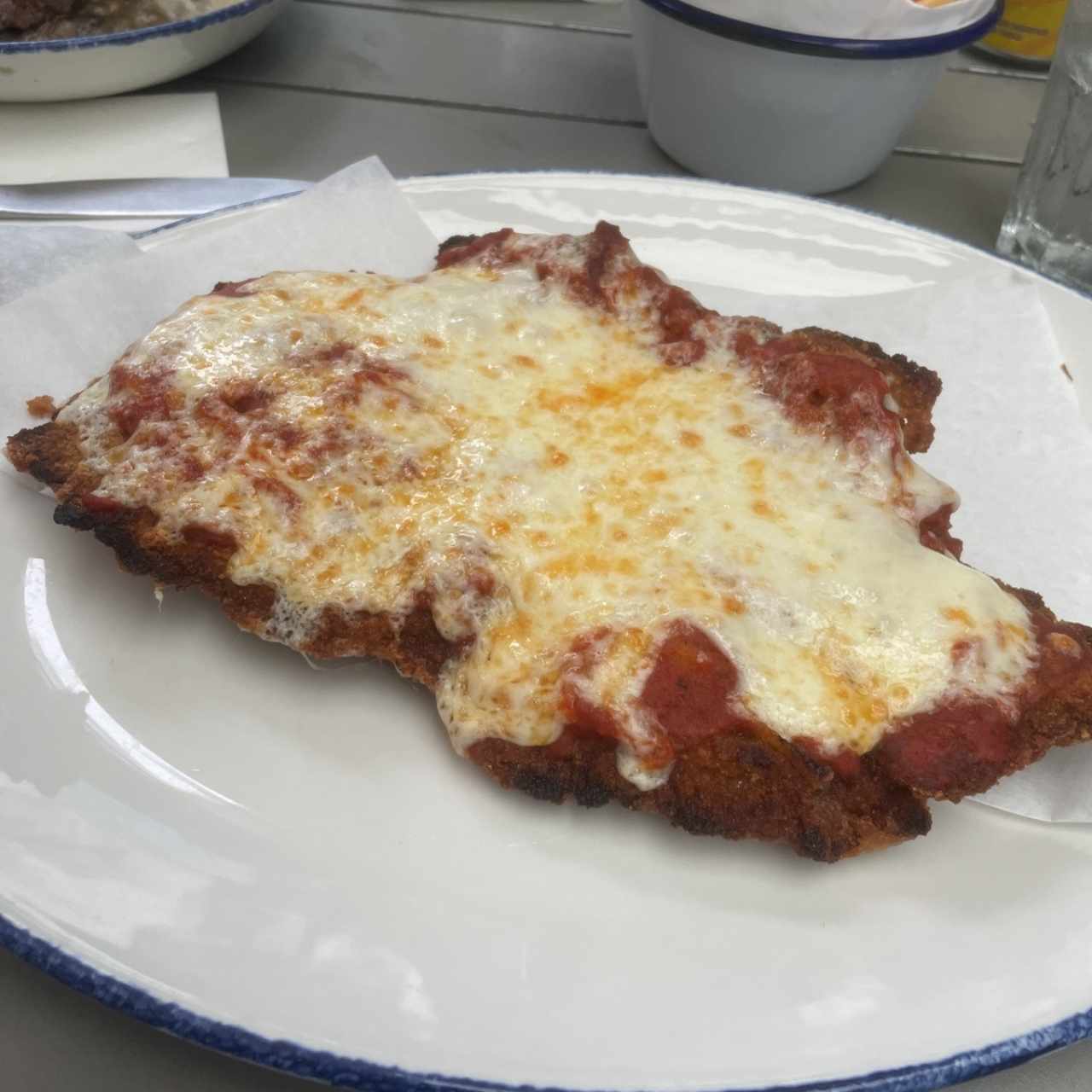 Secondi Piatti - Milanesa de carne parmiggiana