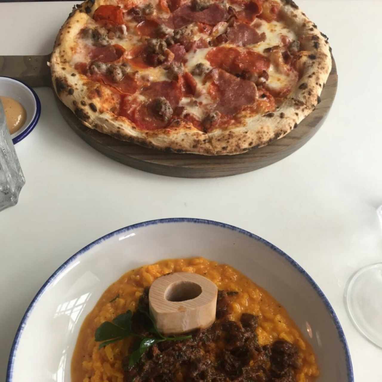 Pizza Carnivor y Risotto de Ossobuco