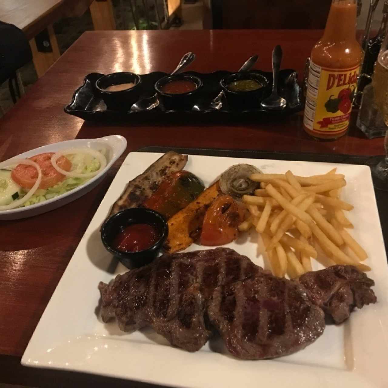 ribeye with grilled veggies and fries