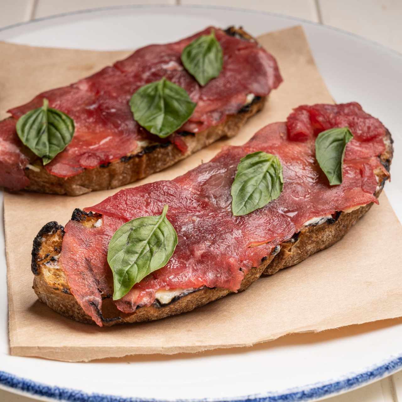 Crostini Di Carpaccio Al Tartufo