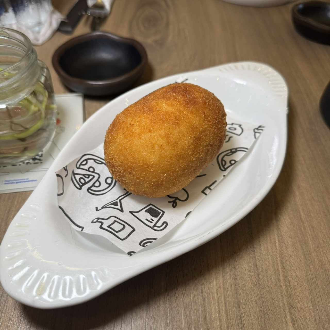 Arancino (Croquetas de arroz frito rellena)