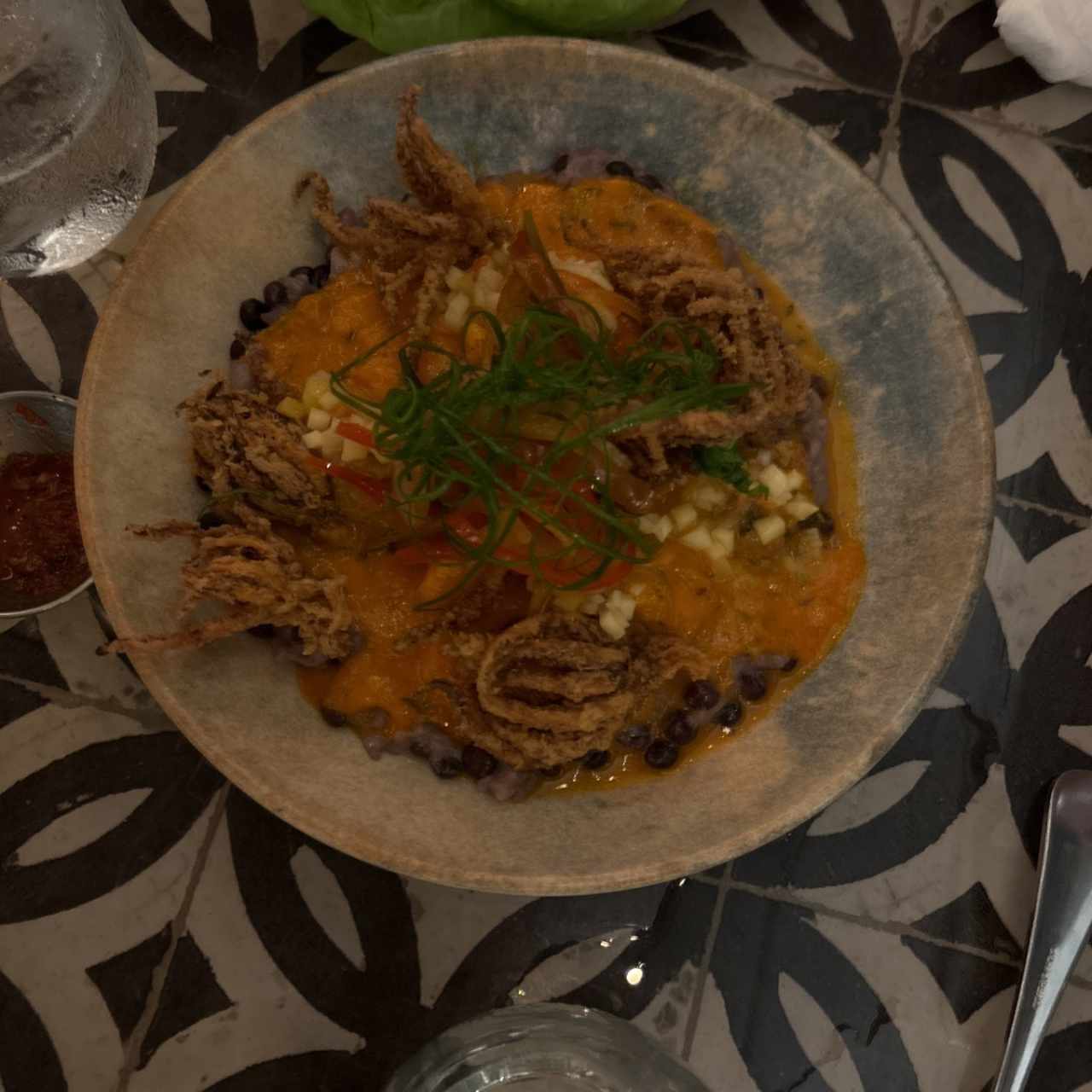 Guacho con guandú, coco y mariscos