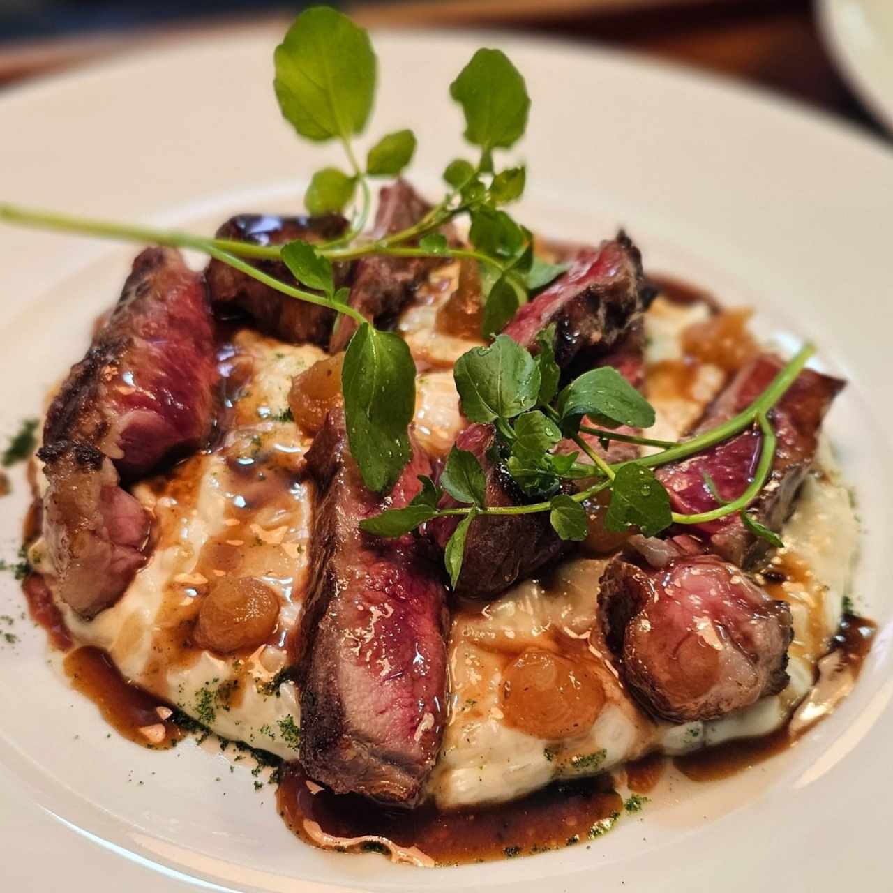 arroz meloso con queso de cabra y rib eye 