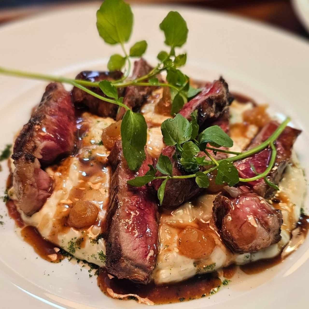 arroz meloso con queso de cabra y rib eye 