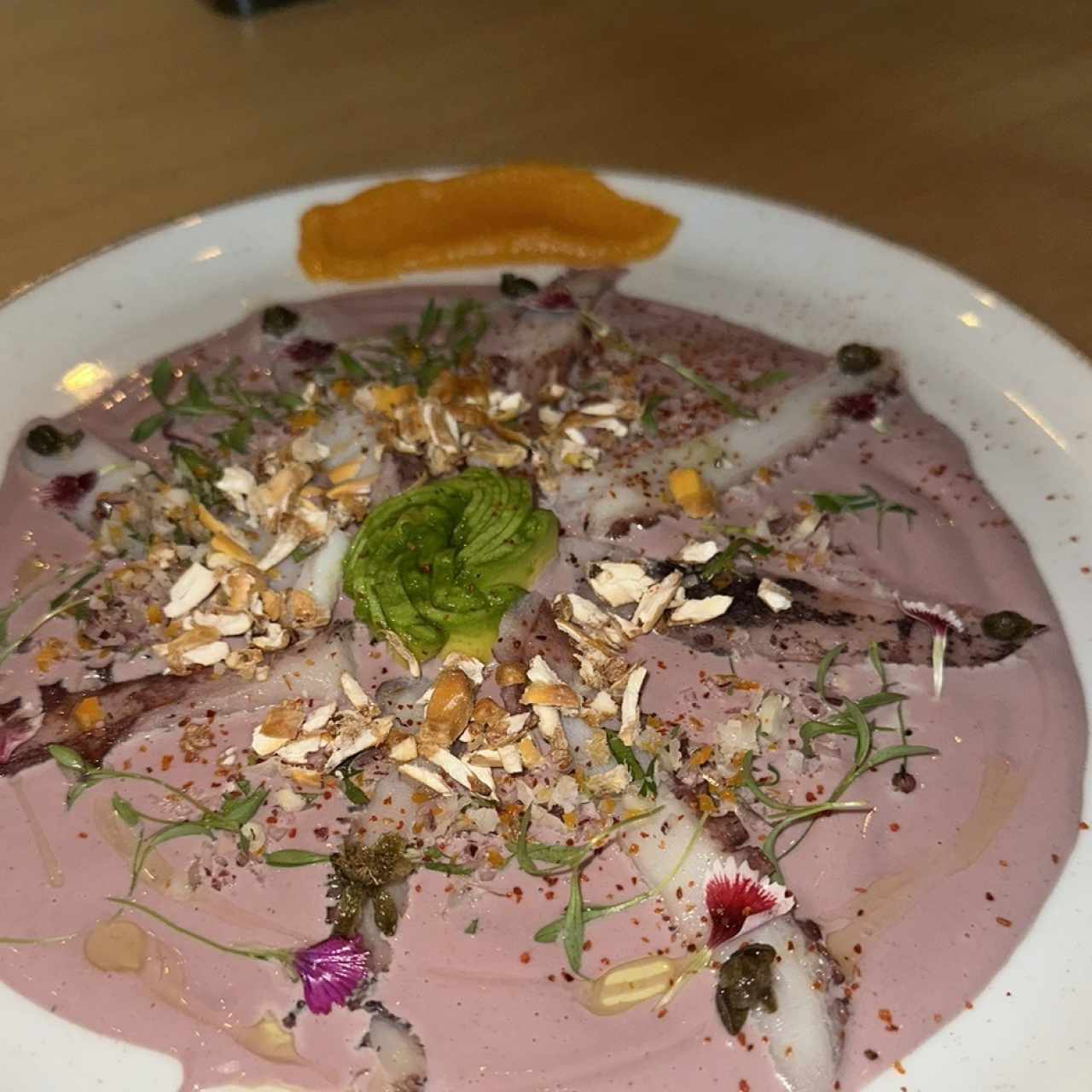 Tiradito de pulpo al olivo