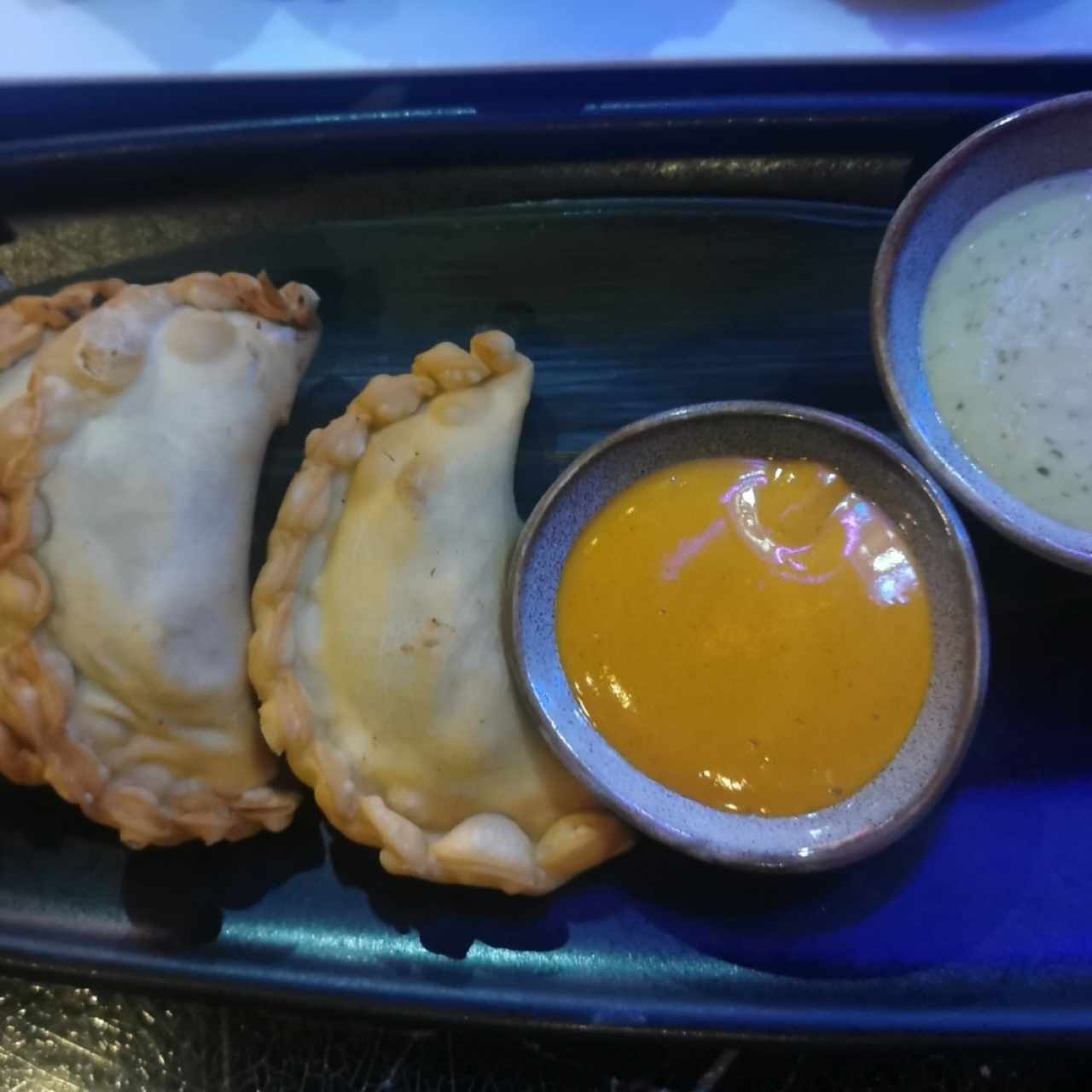 EMPANADAS DE PULPO AL COCO