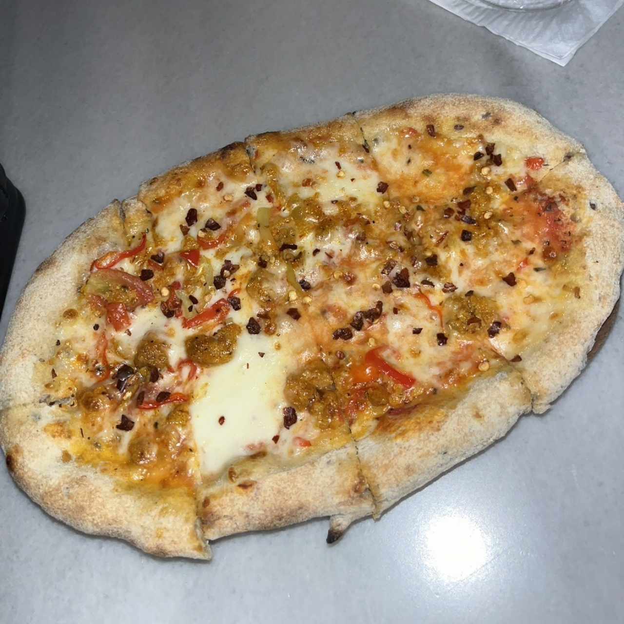 Pizzette - Chorizo,pimientos,Ají Trompito