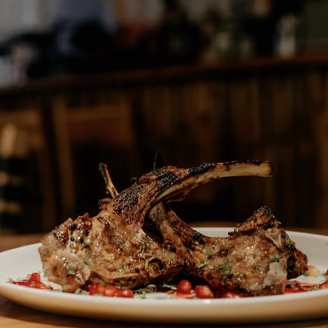 GRILLED LAMB RIBS WITH PLUM SOUCE AND HERBS