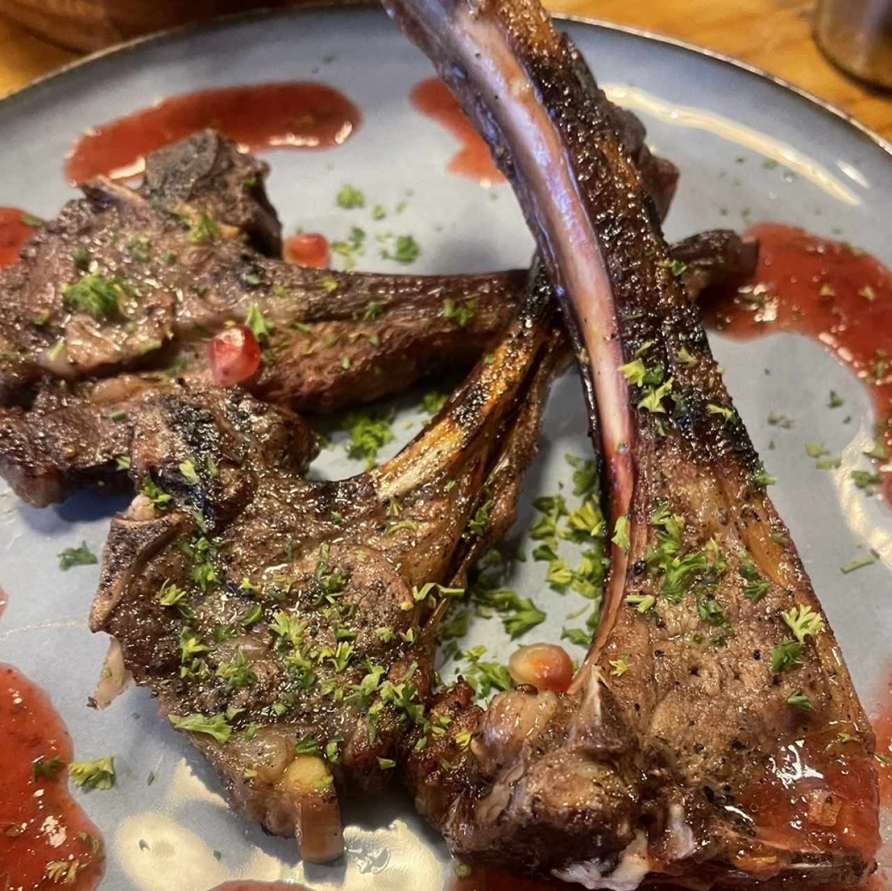 GRILLED LAMB RIBS WITH PLUM SOUCE AND HERBS