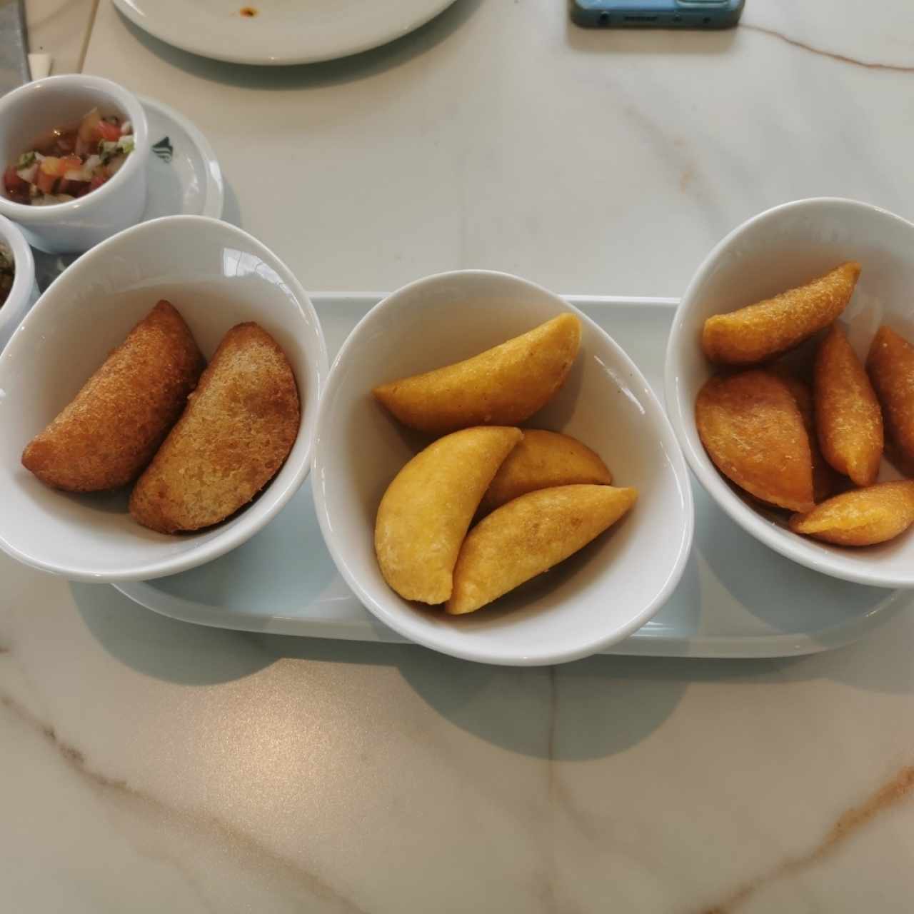 Set de empanadas, ropa vieja, pollo y yuca