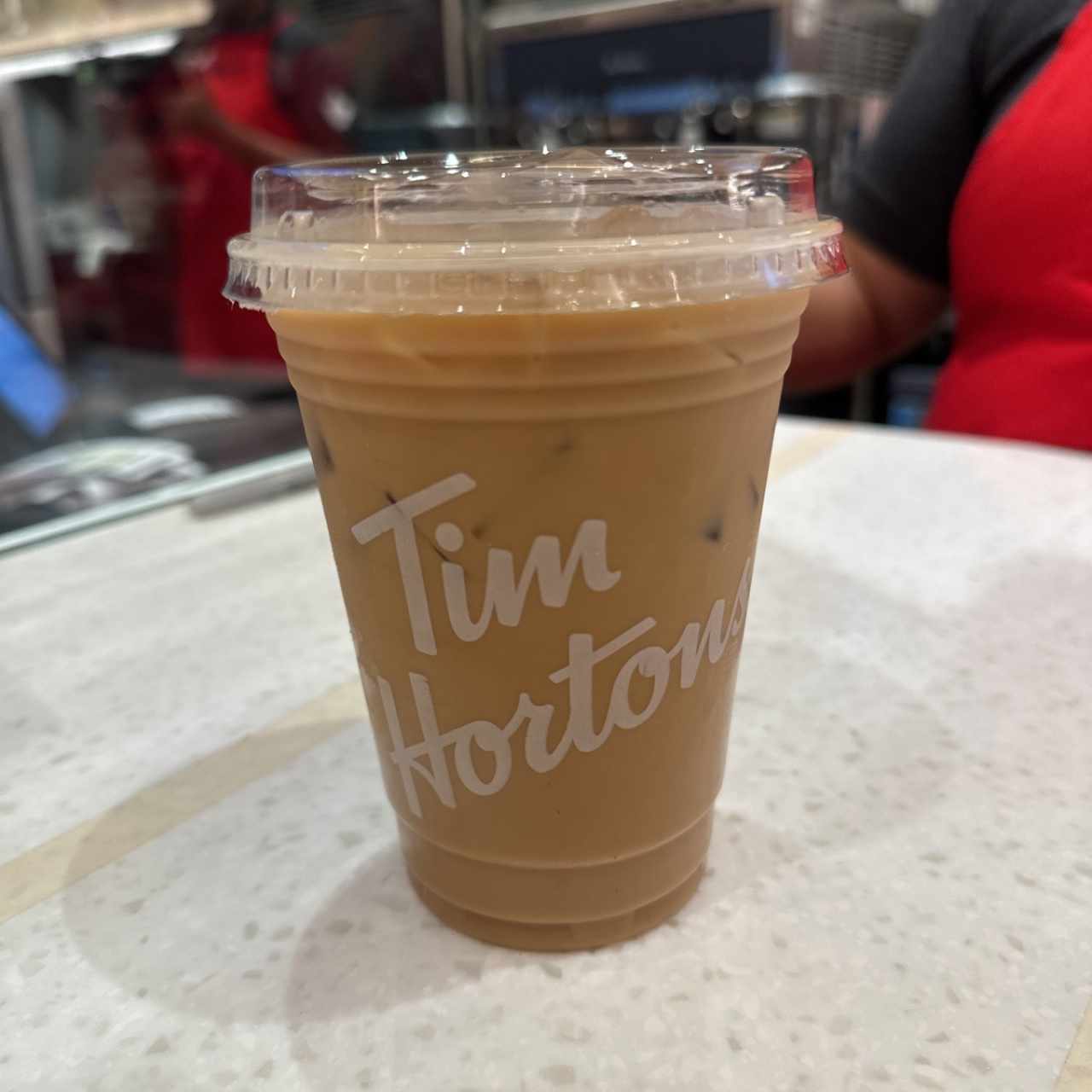 Ice latte con leche de avena y sirop de avellanas