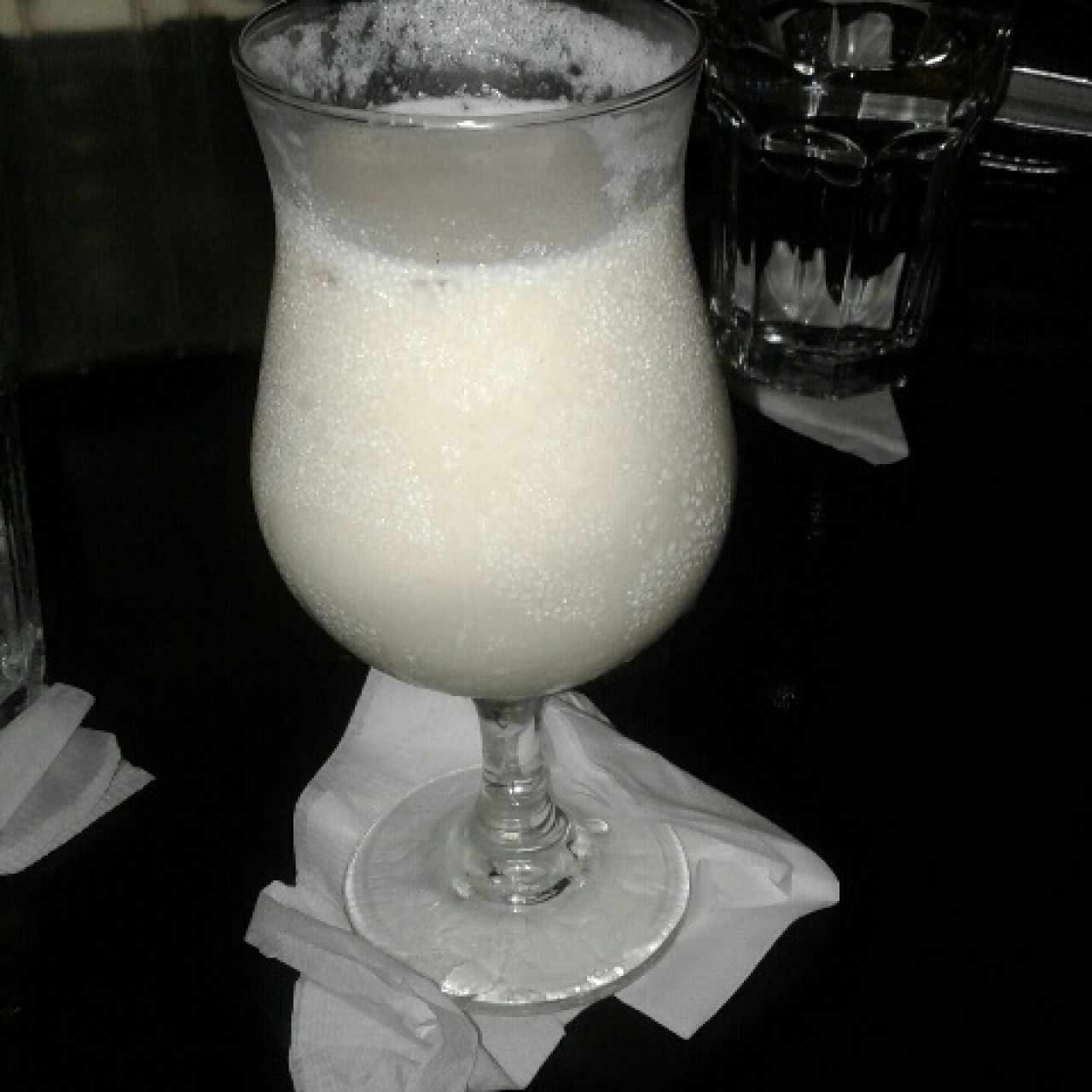 piña colada. en la anterior crema de marisco y arroz con coco