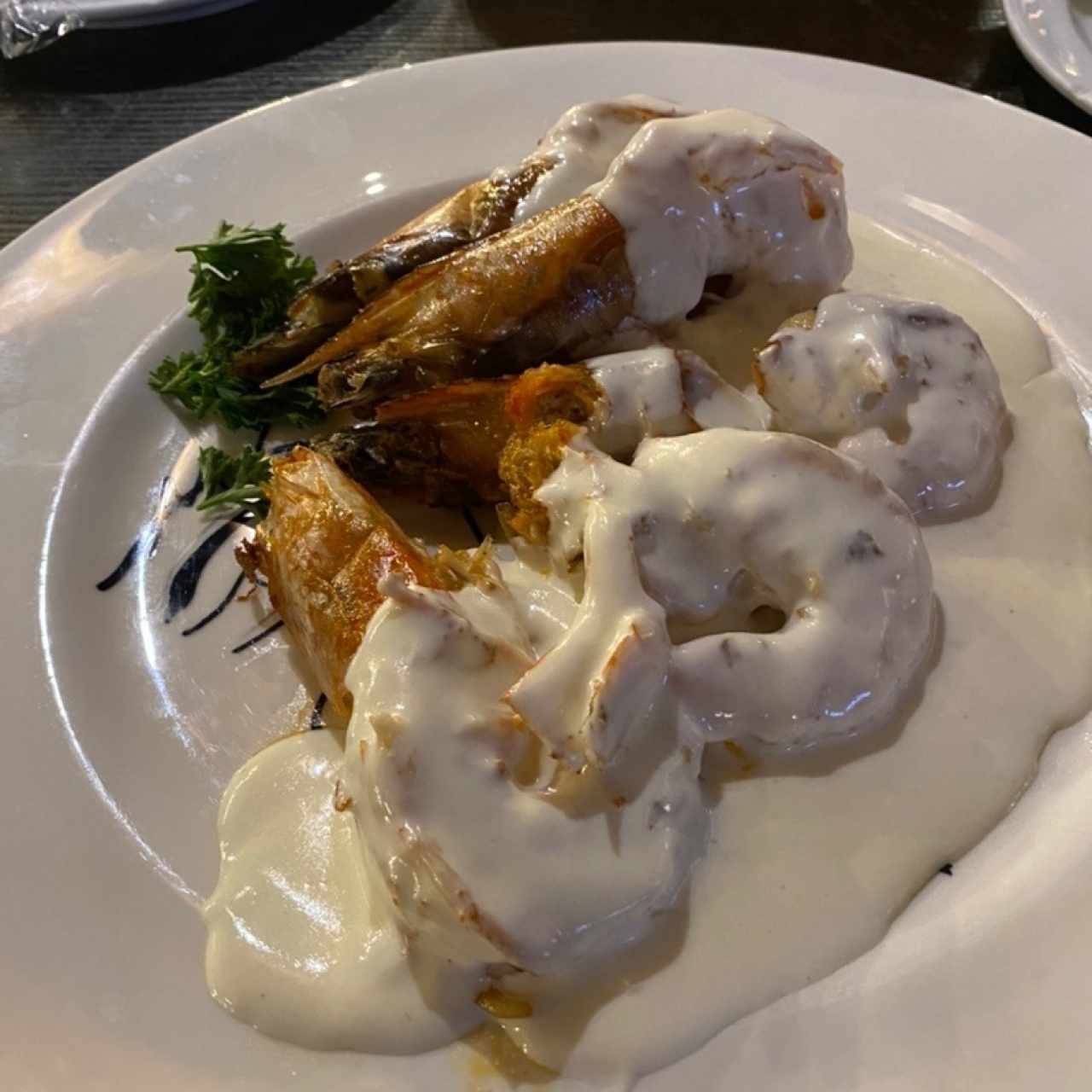 Langostinos a la Mantequilla en salsa blanca