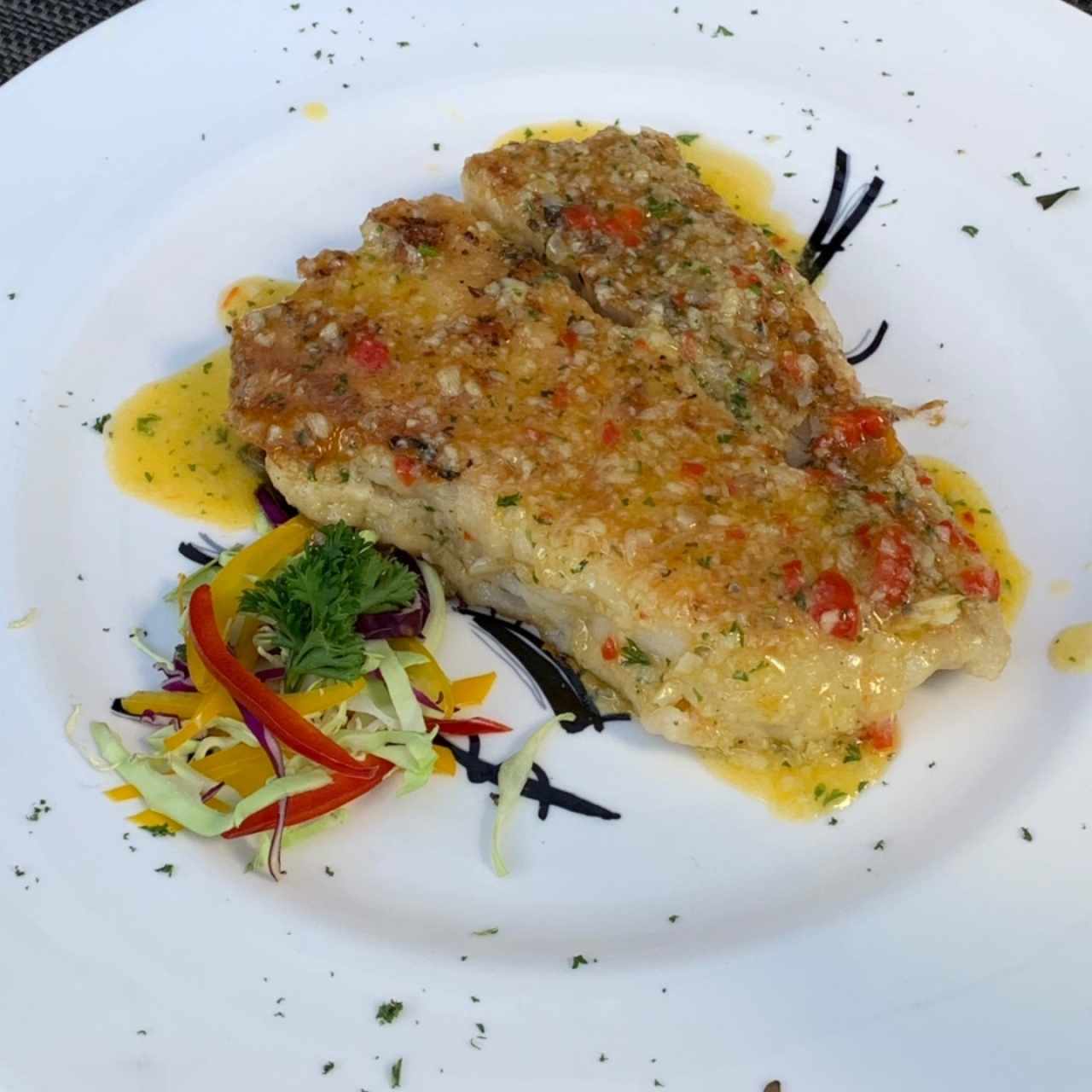 Pescados - Corvina al Ajillo