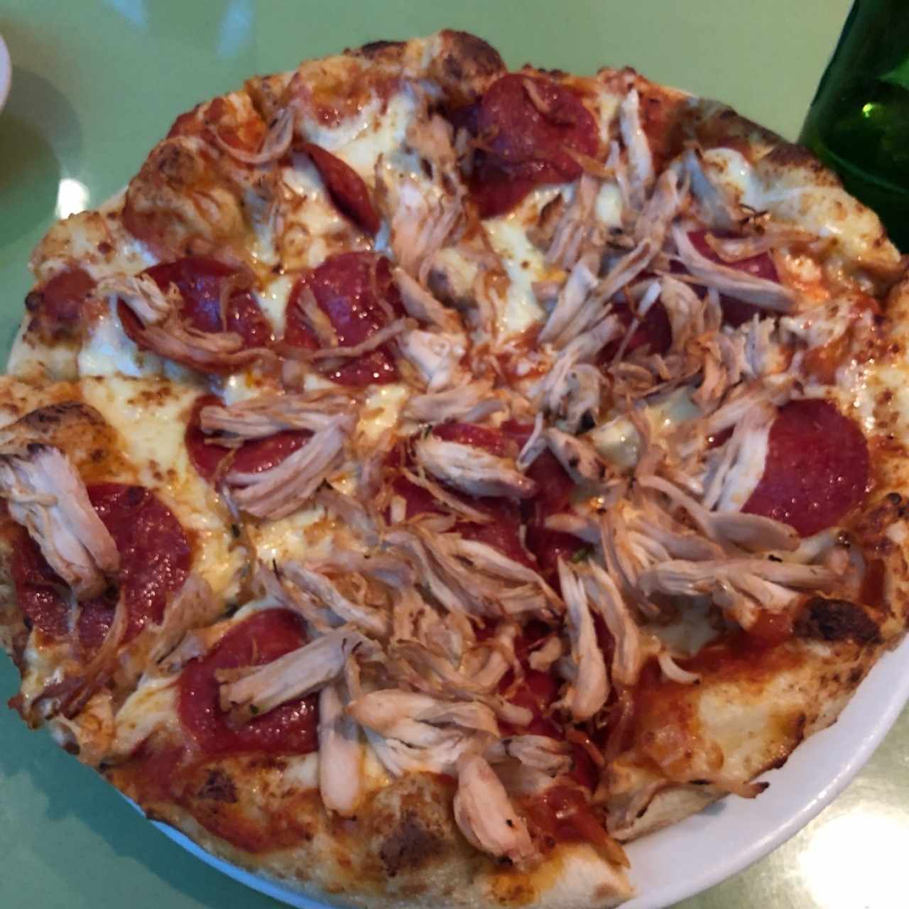 pizza de pollo y pepperoni