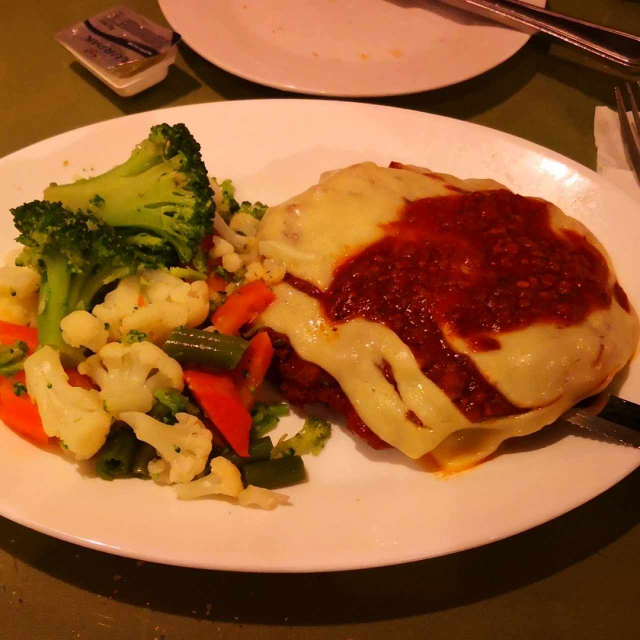 filete a la parmigiana con vegetales hervidos