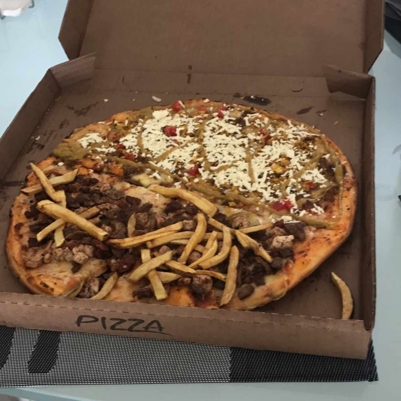 pizza de Parrilla y tacos. 