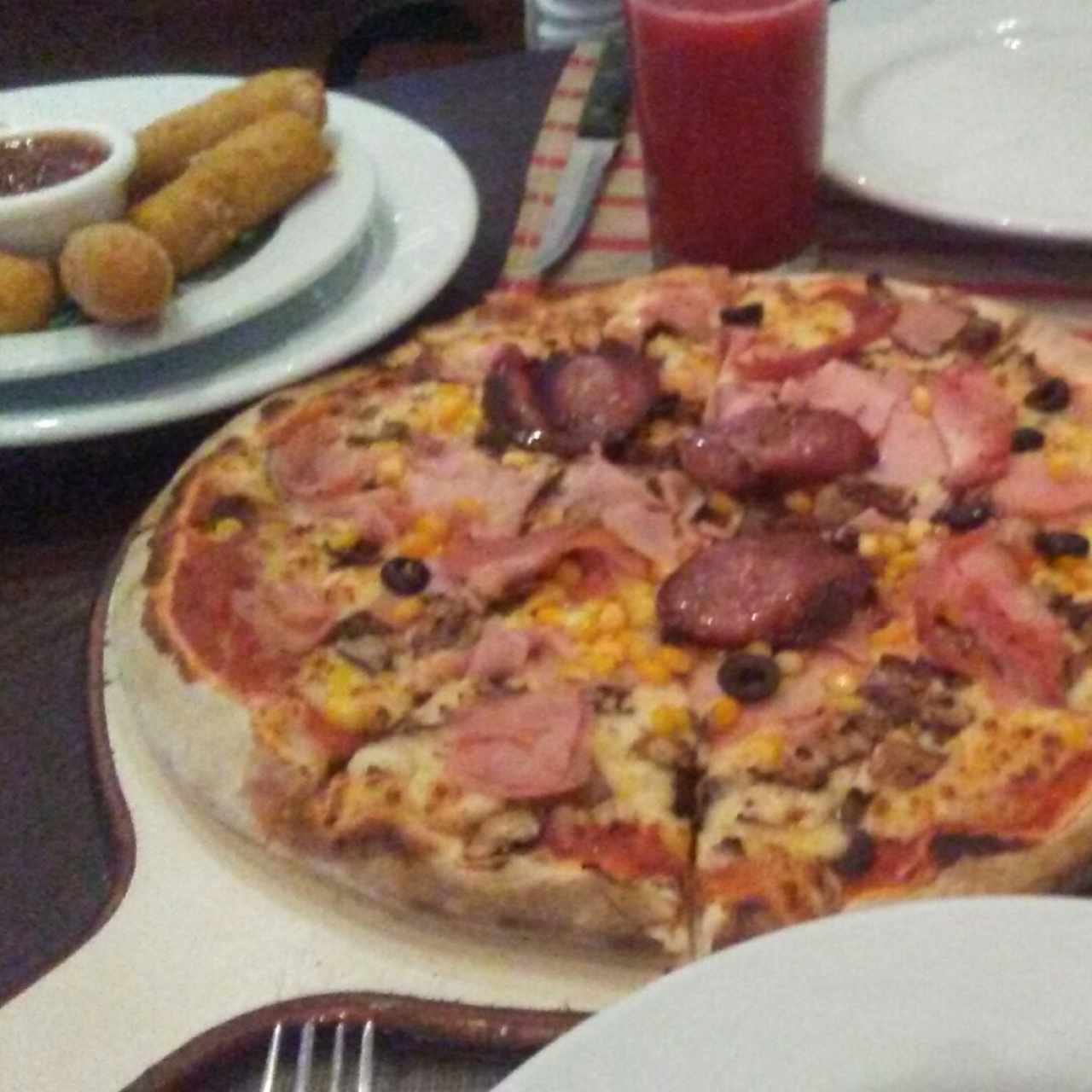 Pizza Mamma Bella y Tequeños