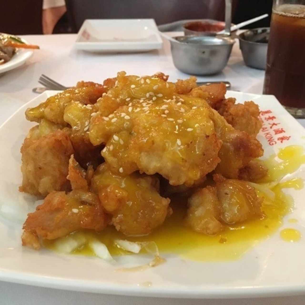 pollo “con ajonjolí” y miel 